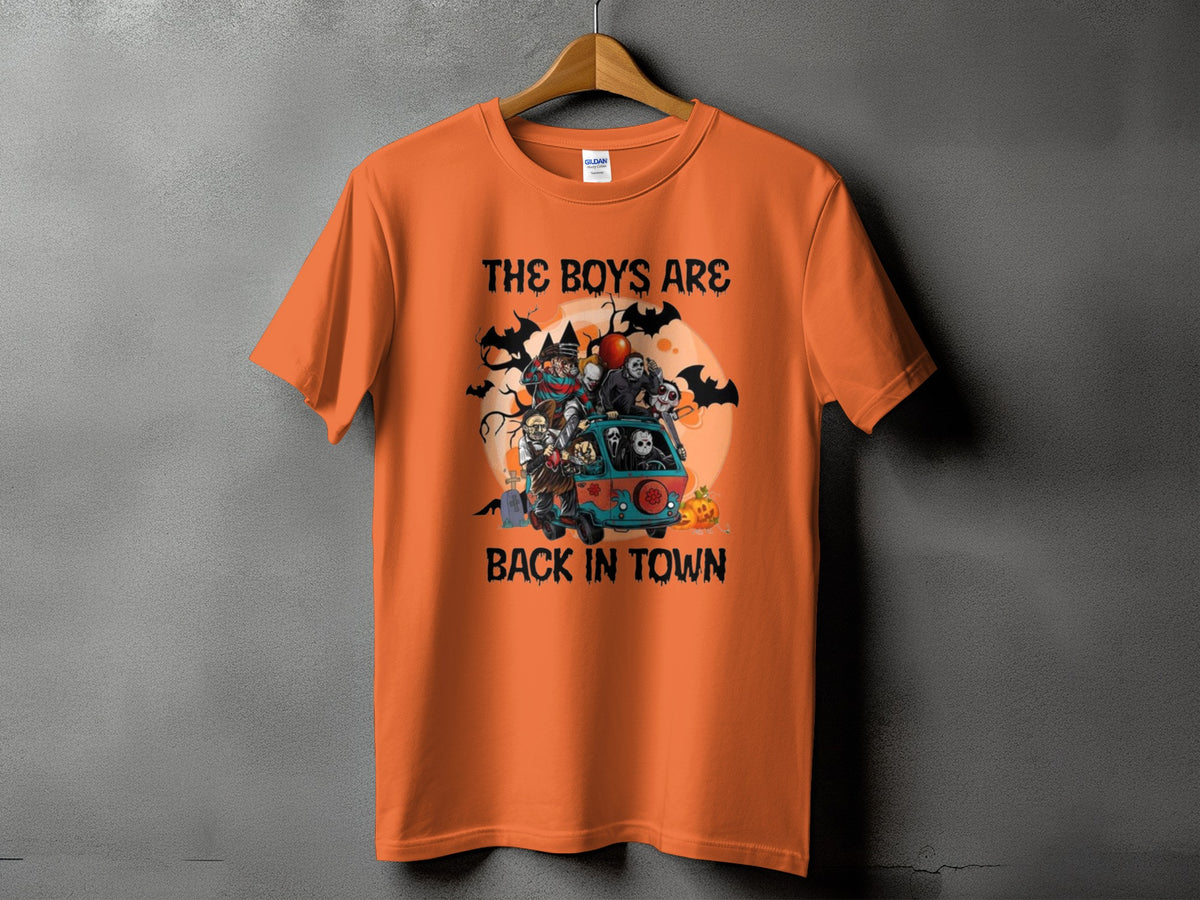 Orange t-shirt with horror movie characters in a van and text "The Boys Are Back In Town".