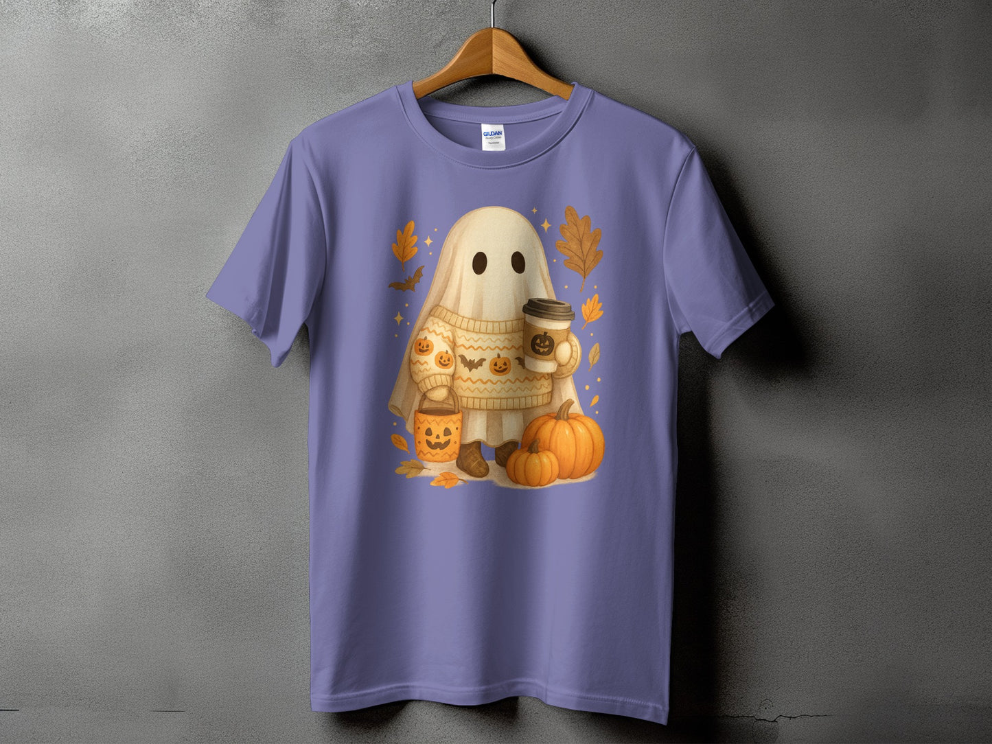 Ghost with sweater, coffee, and pumpkins design on a purple t-shirt.