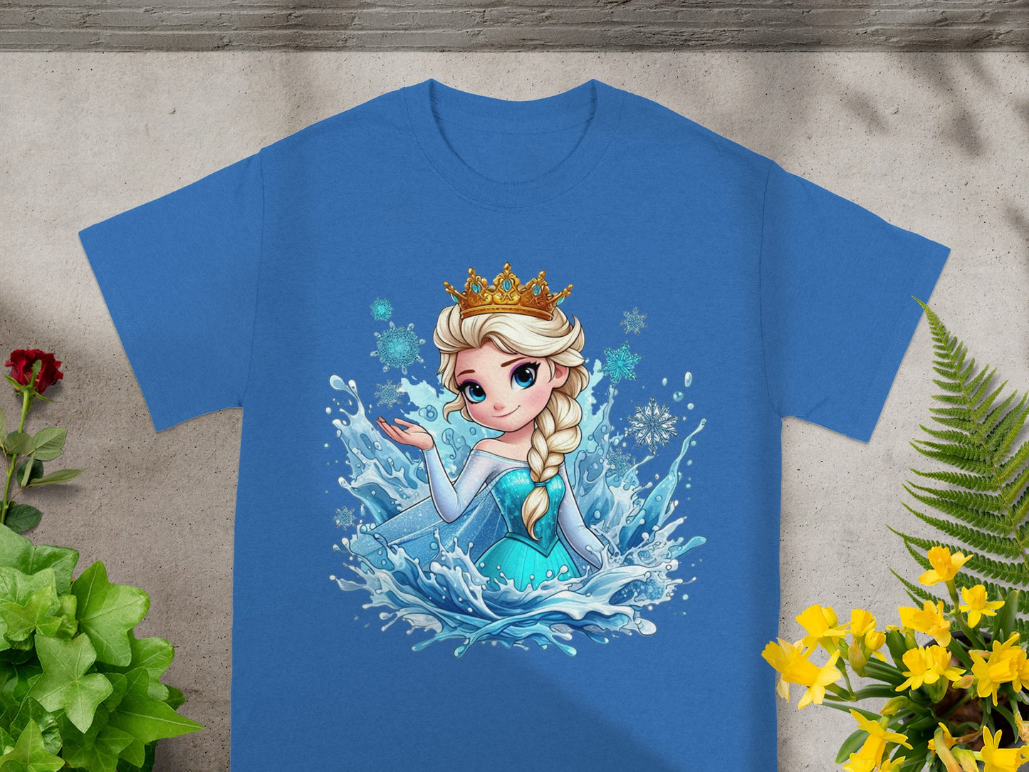 Blue t-shirt with Disney's Elsa from Frozen surrounded by water and snowflakes.