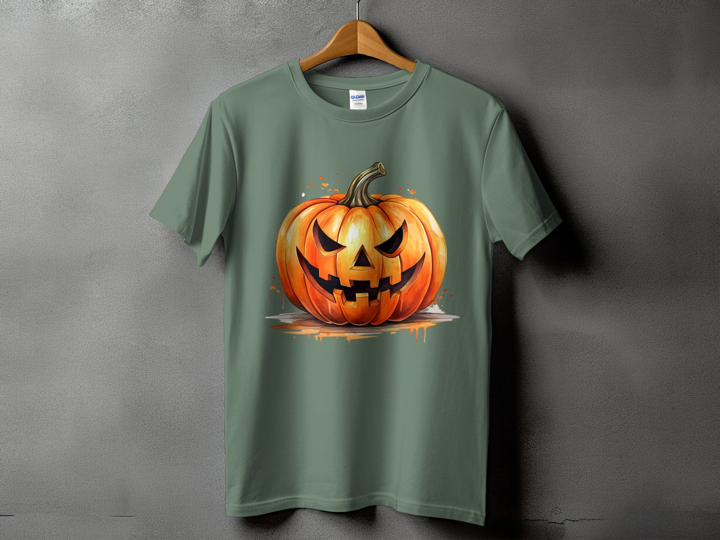 Green t-shirt with a watercolor-style jack-o'-lantern graphic.