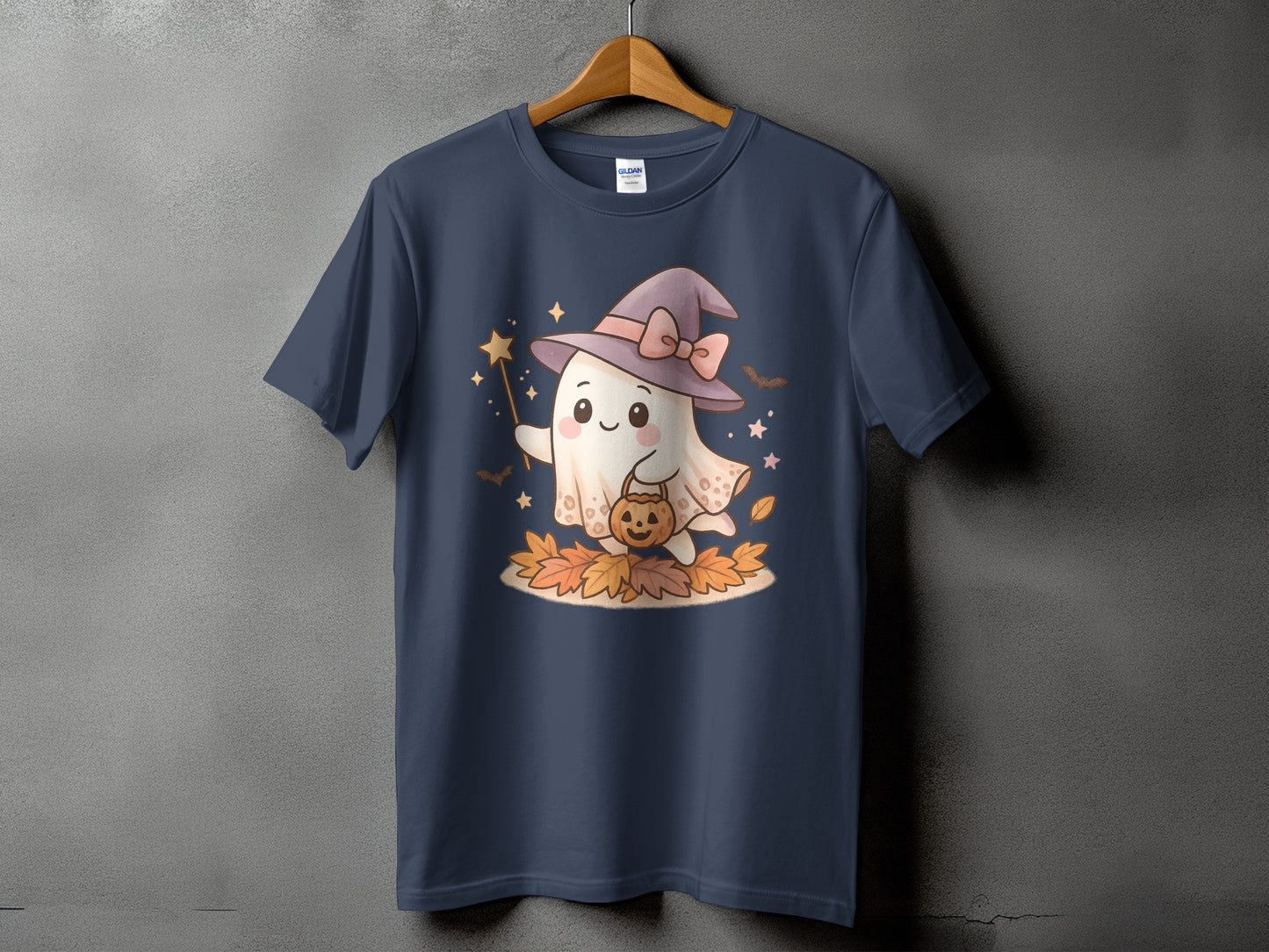 Cute ghost in witch hat holding candy bucket and wand on fallen leaves.