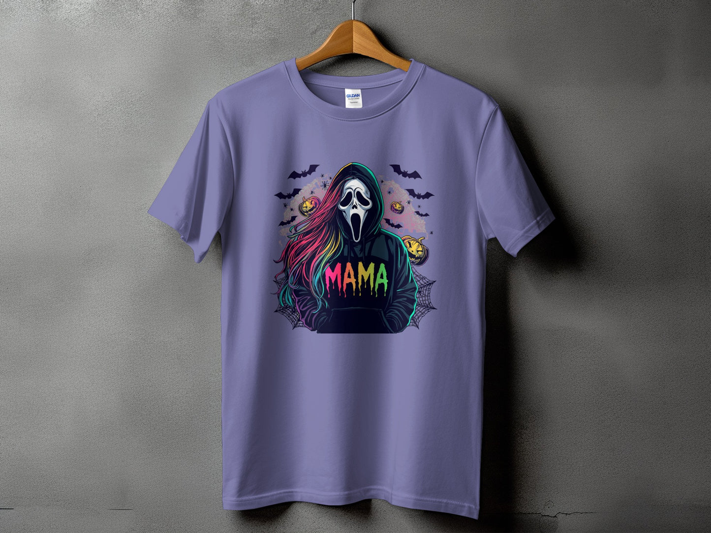 Purple t-shirt with a ghost face graphic and "MAMA" text, bats, pumpkins, and spiderwebs.