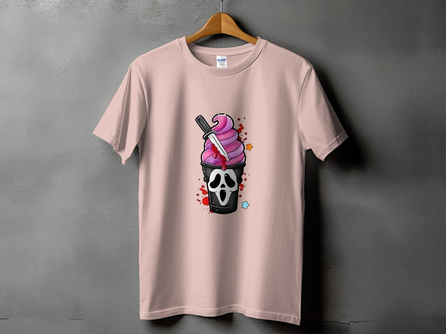 Pink t-shirt with ghost ice cream cone and knife graphic.