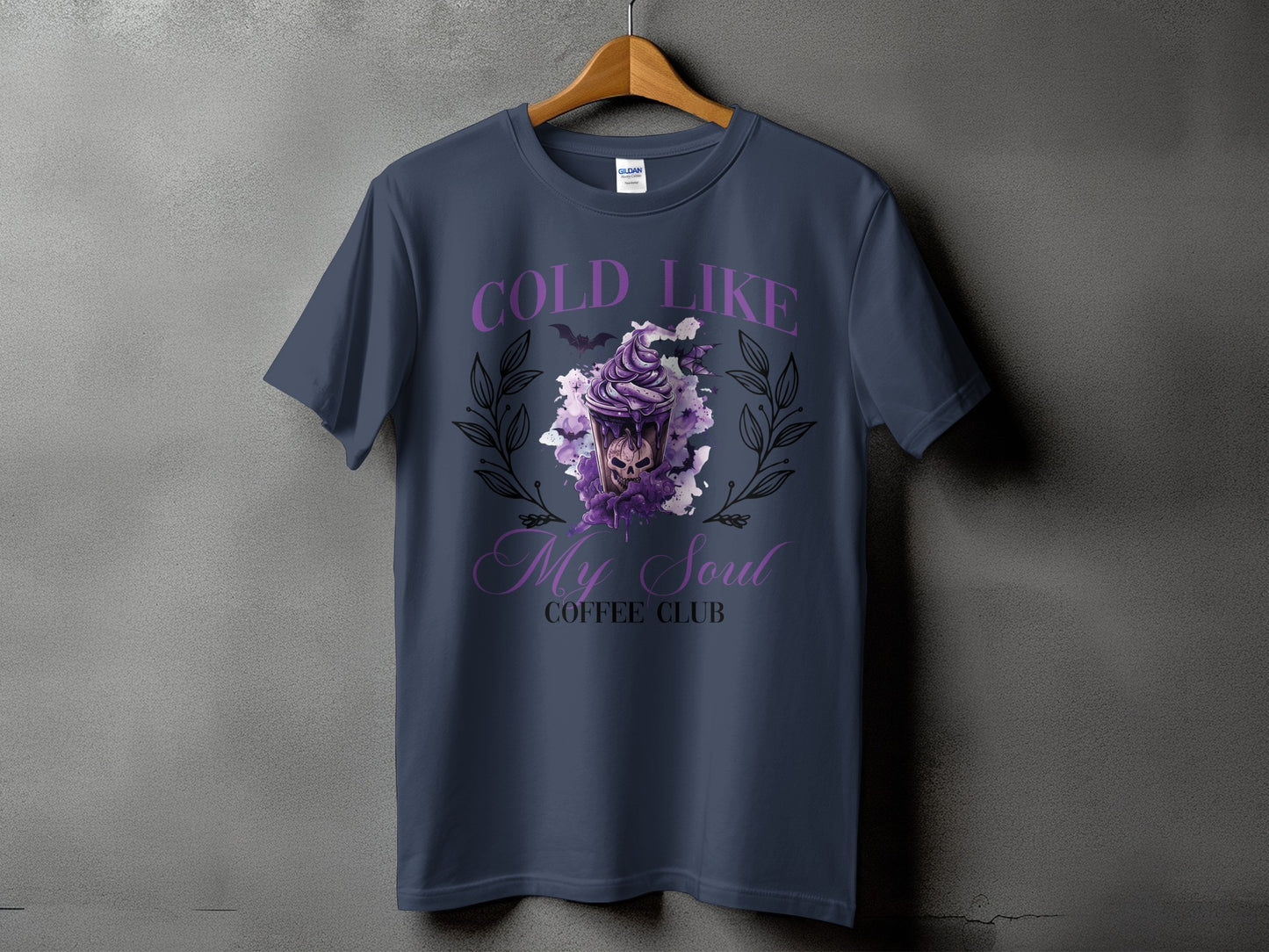 Dark blue t-shirt with "COLD LIKE My Soul COFFEE CLUB" text and skull coffee graphic.