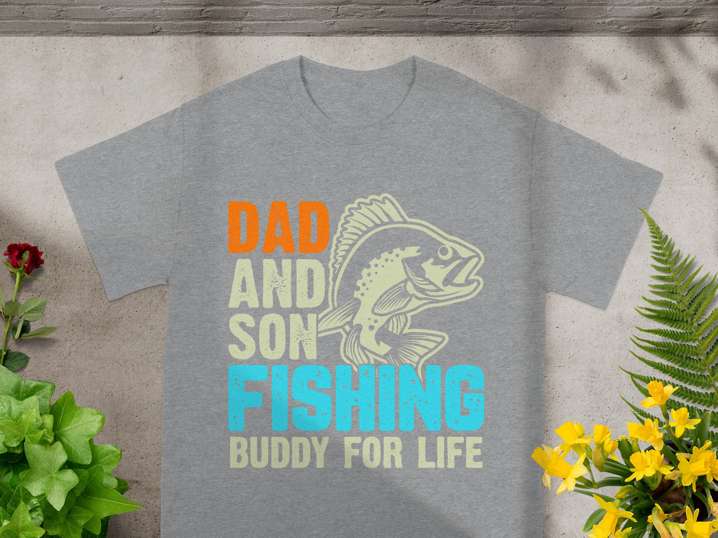 Grey t-shirt with "Dad and Son Fishing Buddy for Life" text and fish graphic.