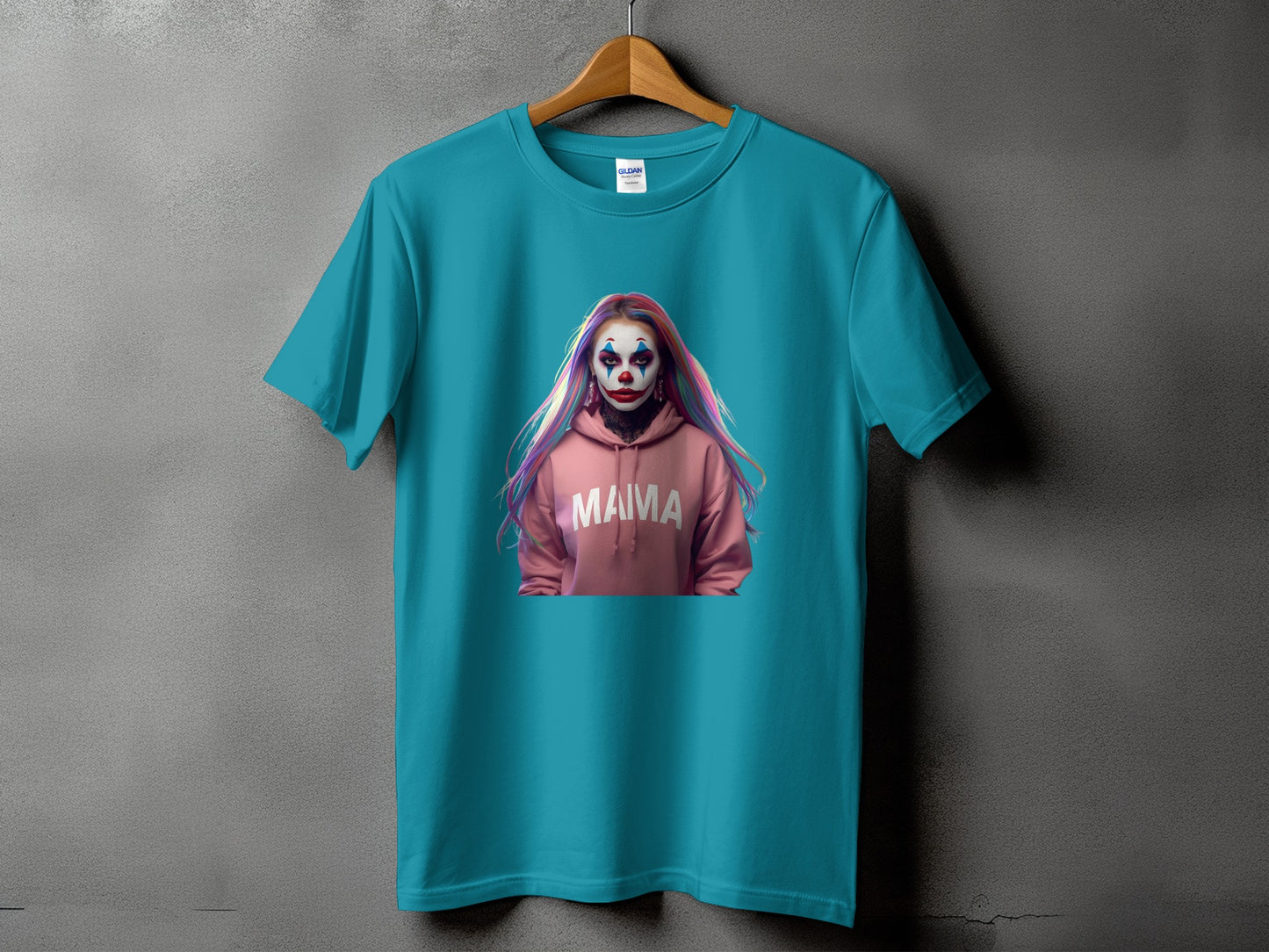 Teal t-shirt with a clown graphic and "MAMA" text on a pink hoodie.