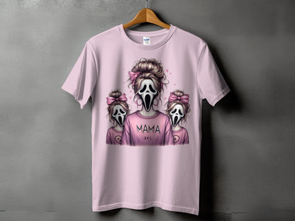 Pink t-shirt with ghost masks and text "MAMA DES"