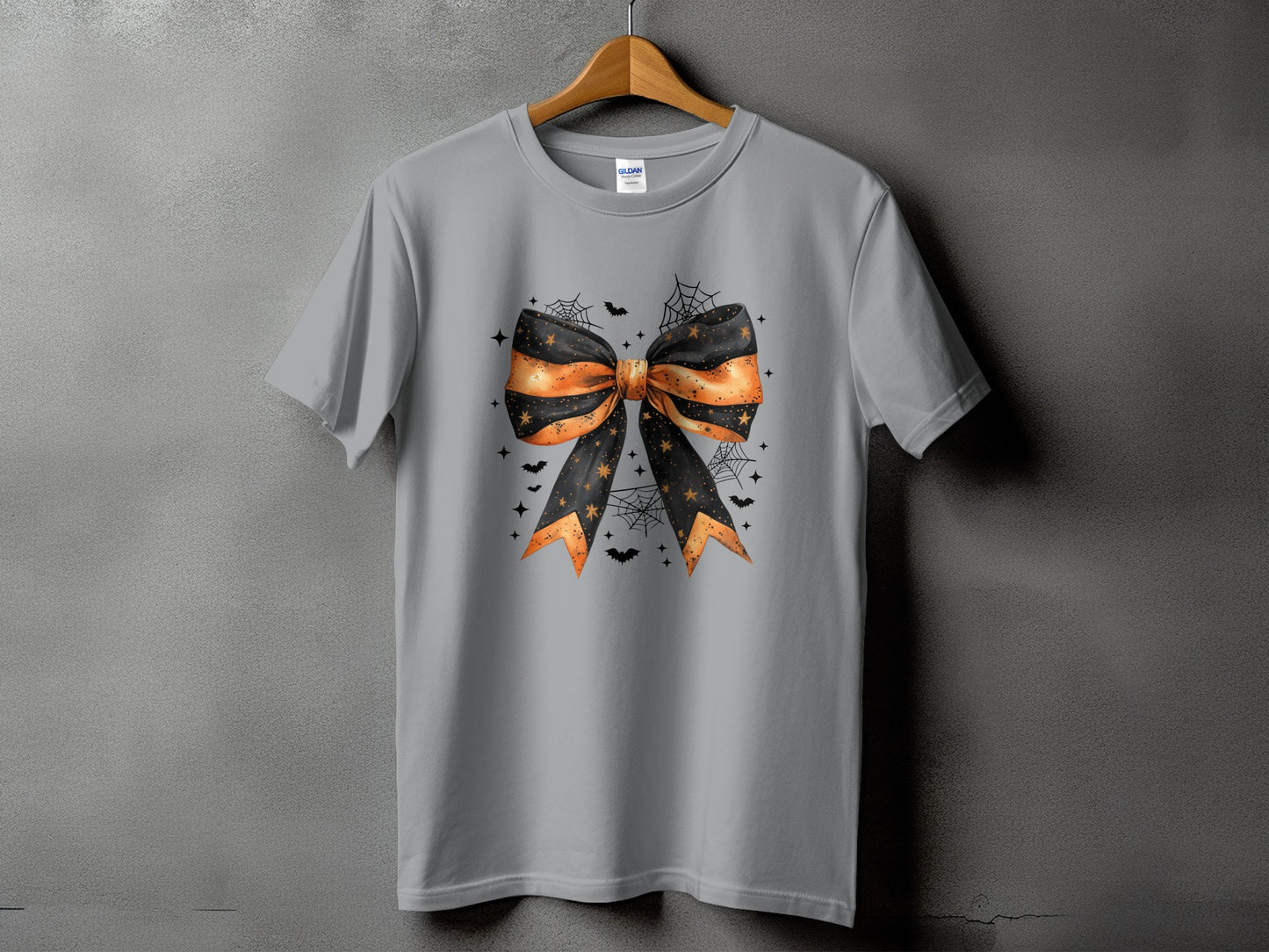 Grey t-shirt with a Halloween bow graphic featuring bats and cobwebs.
