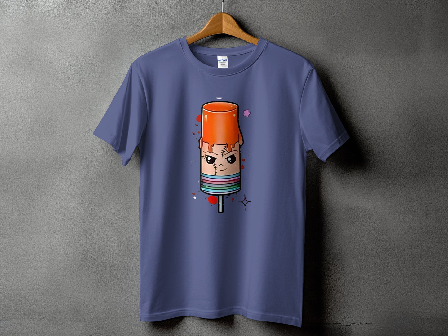 Purple t-shirt with a cartoon drawing of a spooky popsicle with stitches and colorful stripes.