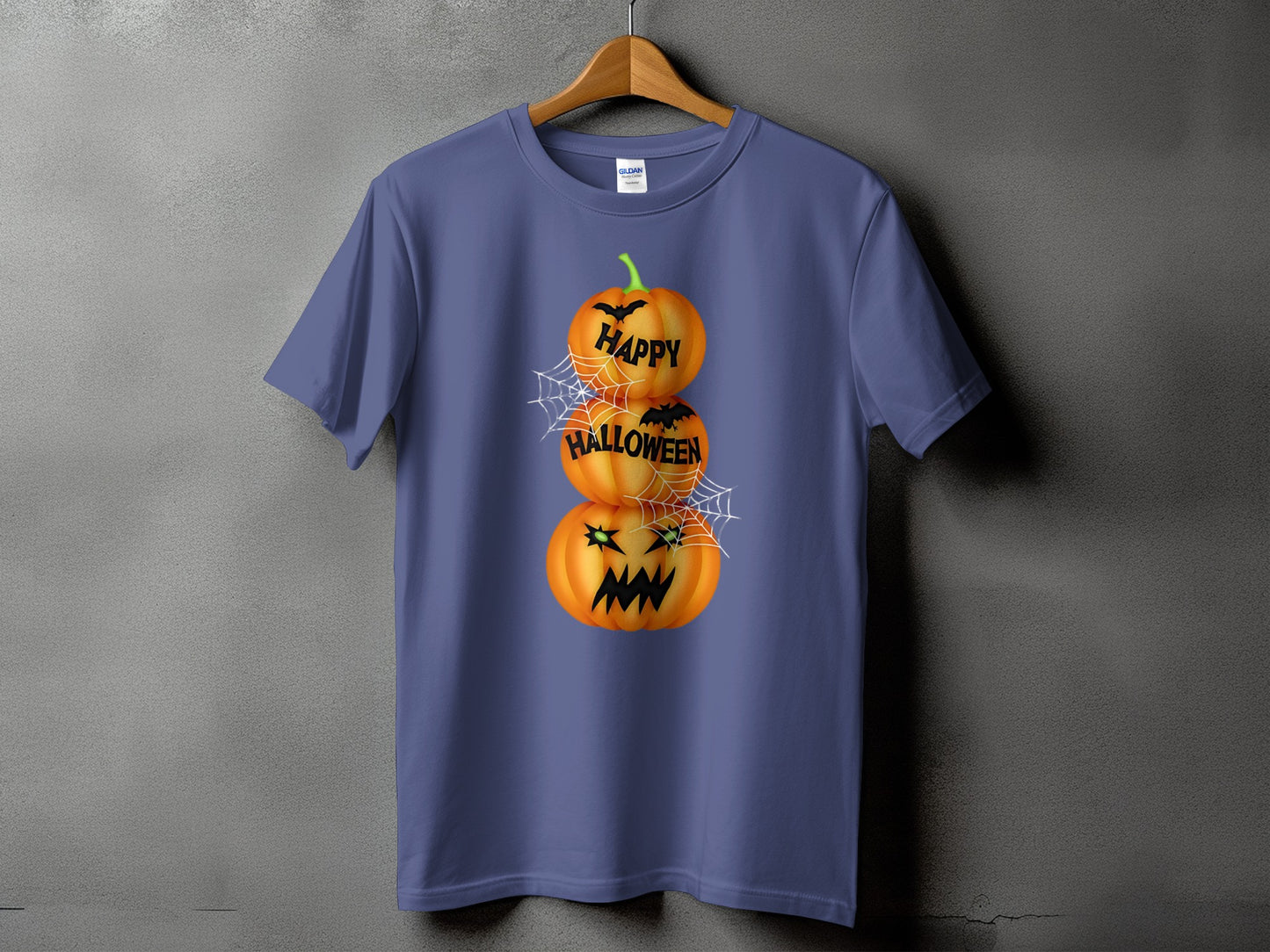 T-shirt with stacked Halloween pumpkins reading "Happy Halloween" and spiderwebs.