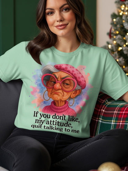 Light green t-shirt with watercolor portrait of a woman and text.