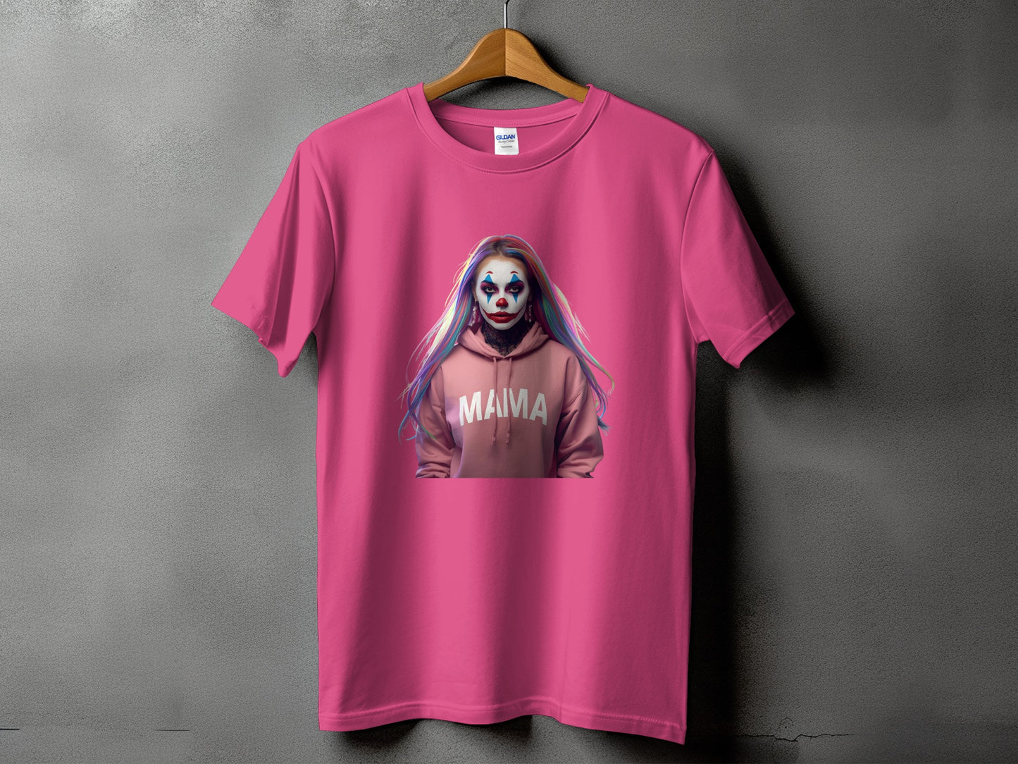 Pink t-shirt with a graphic of a person in clown makeup and a hoodie with "MAMA" text.