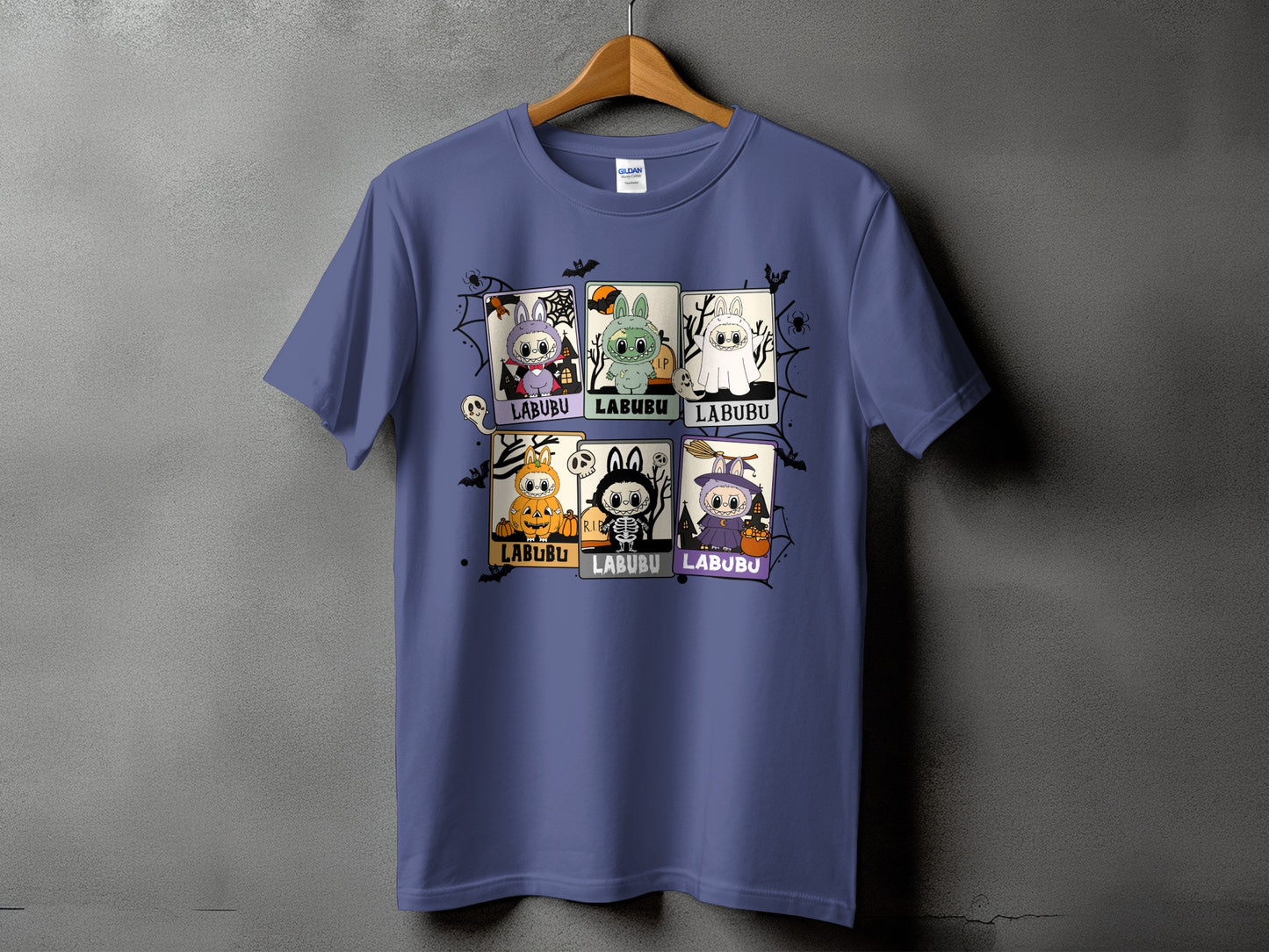 Purple t-shirt with six Halloween-themed Labubu character panels.