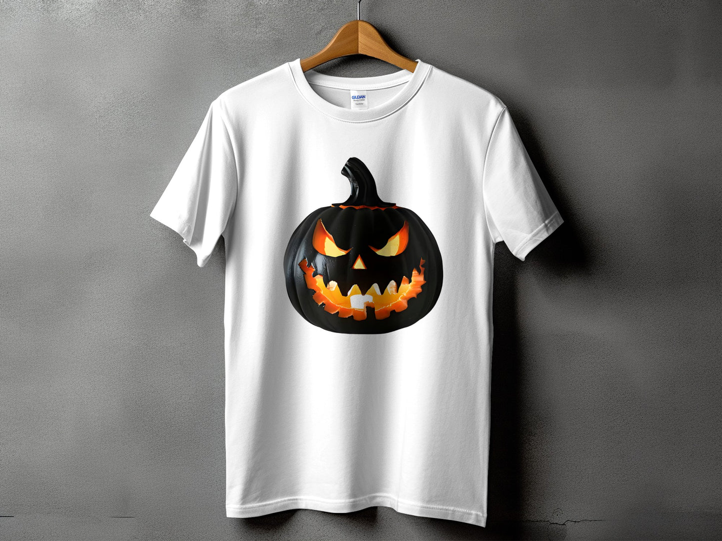 White t-shirt with a black jack-o'-lantern graphic featuring glowing orange eyes and mouth.