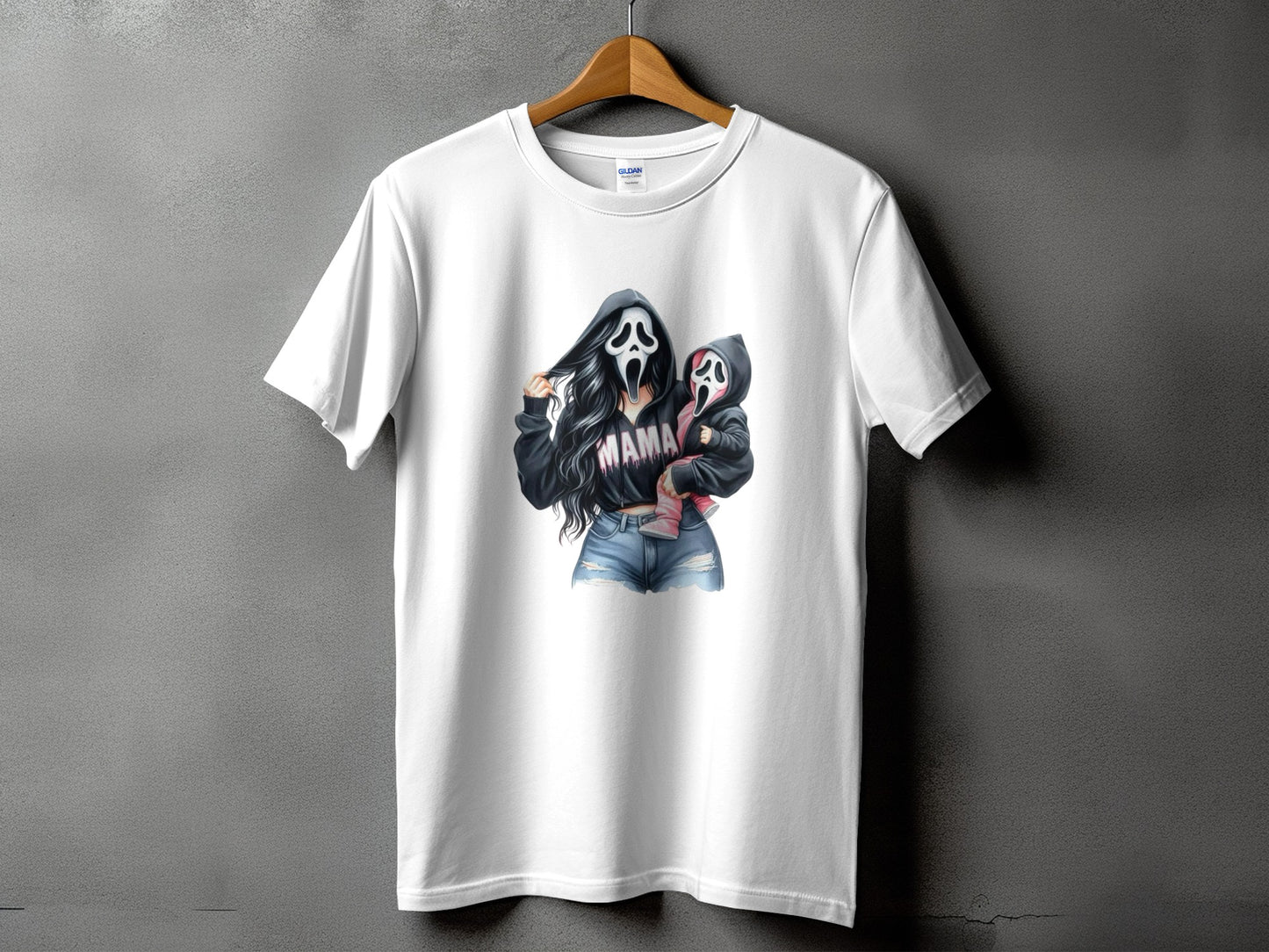 White t-shirt with graphic of a woman and child wearing Scream masks and "MAMA" text.
