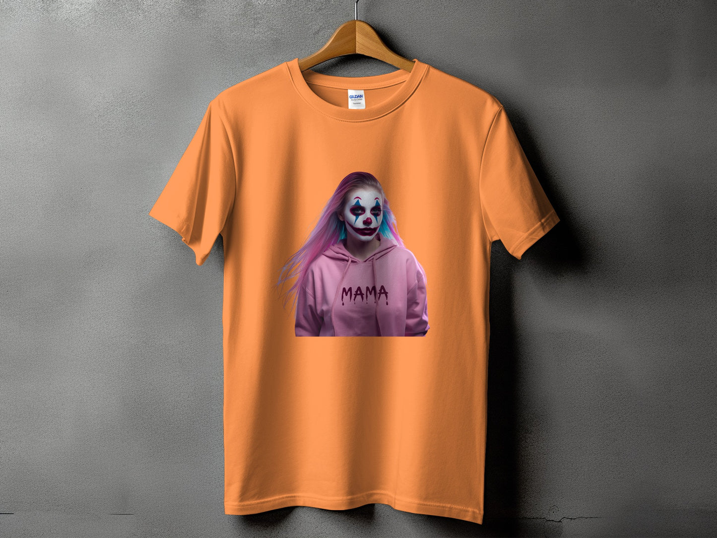Orange t-shirt with a graphic of a person in clown makeup and a pink hoodie with "MAMA" text.