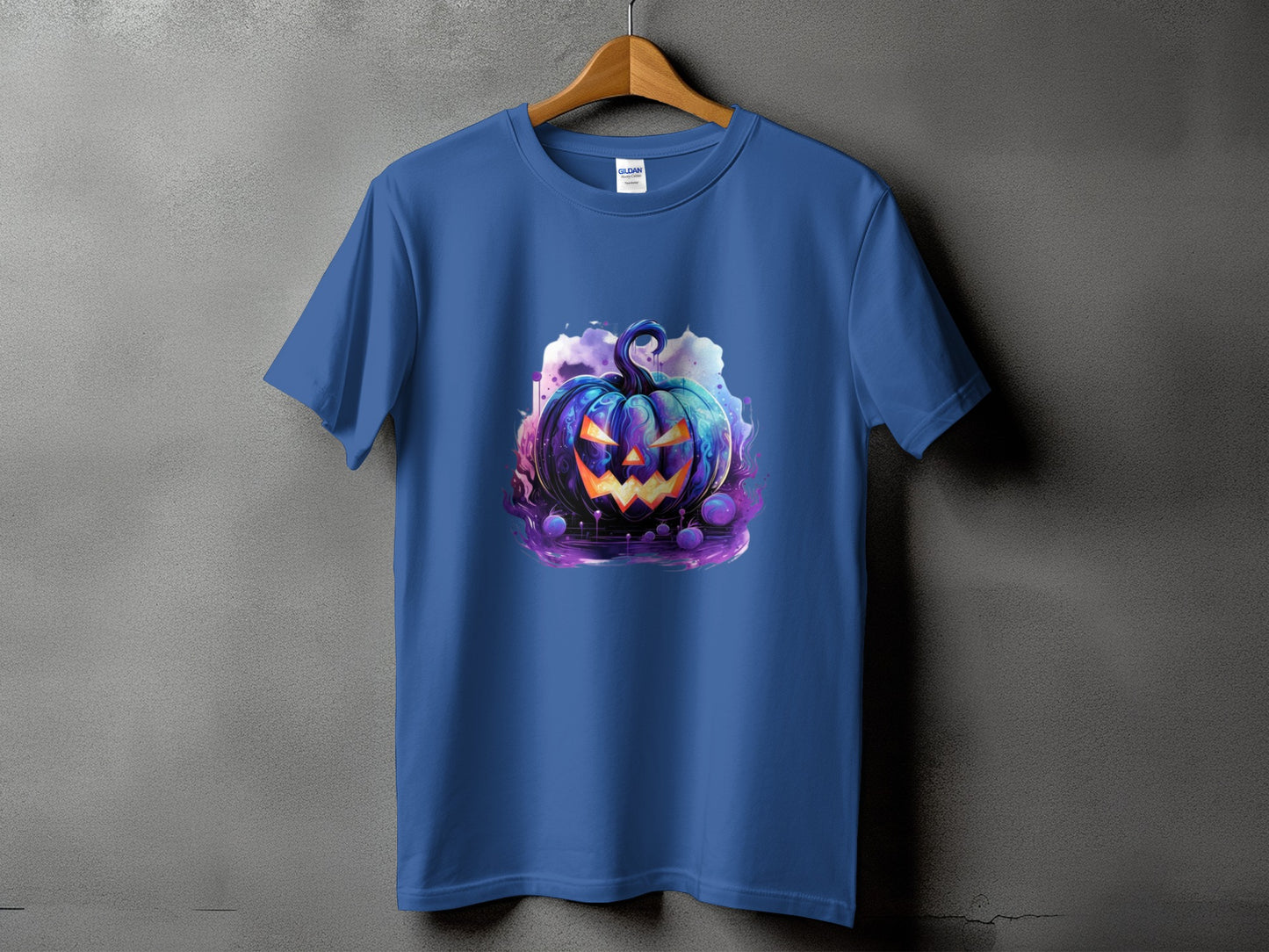 Blue t-shirt with a colorful, stylized jack-o'-lantern graphic and purple swirling smoke.