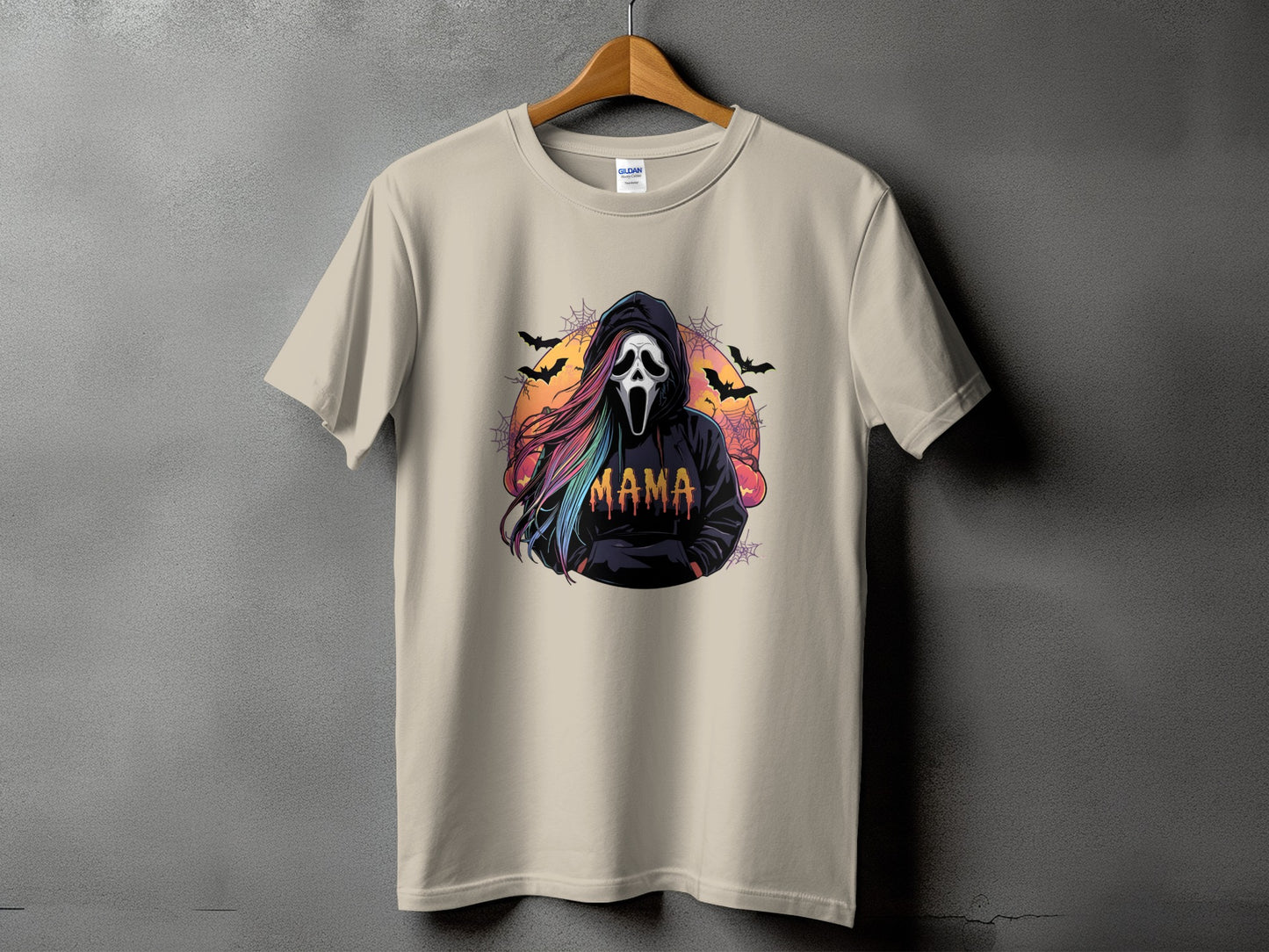 T-shirt with a ghost face mask, rainbow hair, and "MAMA" text.