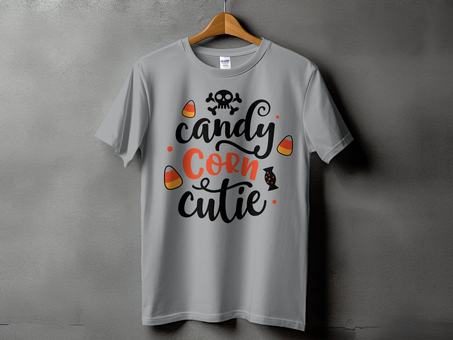 Gray t-shirt with "Candy Corn cutie" text and Halloween graphics.