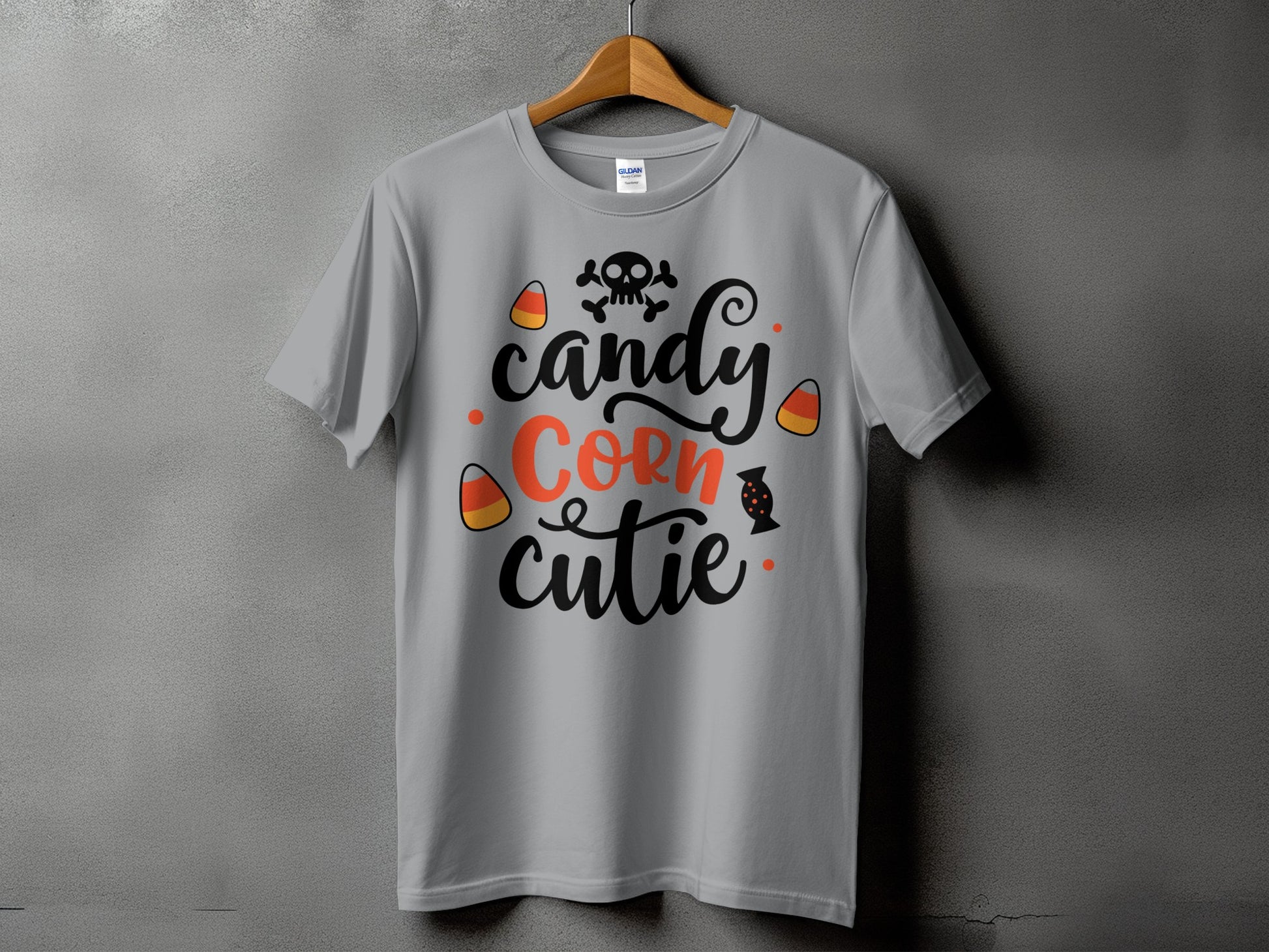 Gray t-shirt with "Candy Corn cutie" text and Halloween graphics.