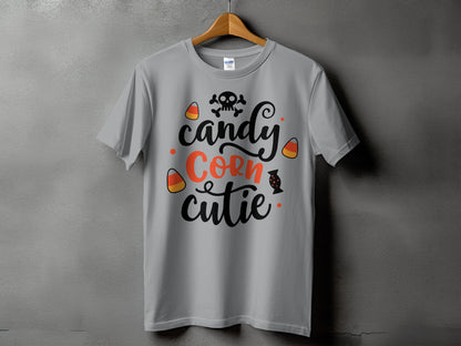 Gray t-shirt with "Candy Corn cutie" text and Halloween graphics.