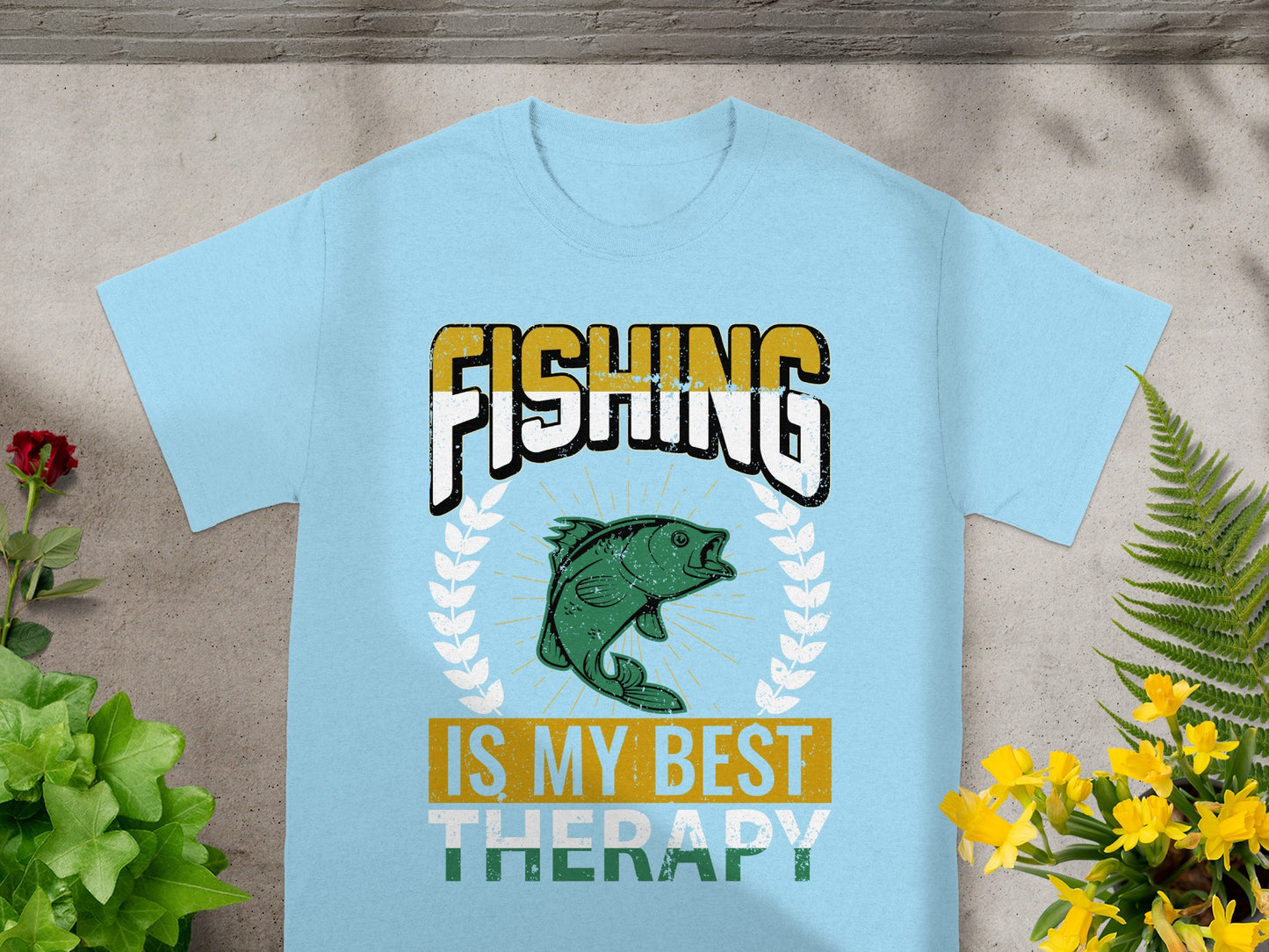 Light blue t-shirt with "FISHING IS MY BEST THERAPY" and fish graphic.