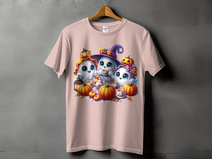 Three cute ghosts with pumpkins and a teapot on a pink t-shirt.