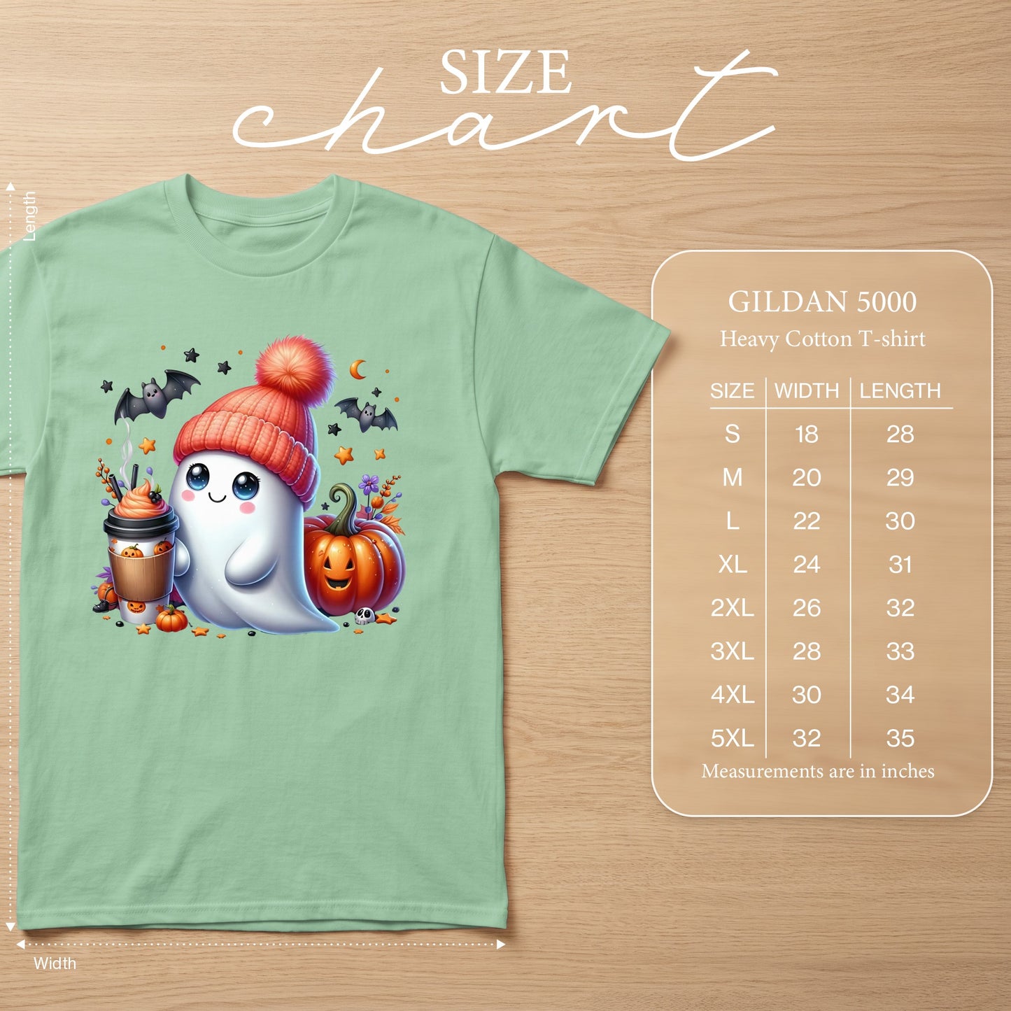 Green t-shirt with cartoon ghost, pumpkin, bats, and coffee cup, with size chart.