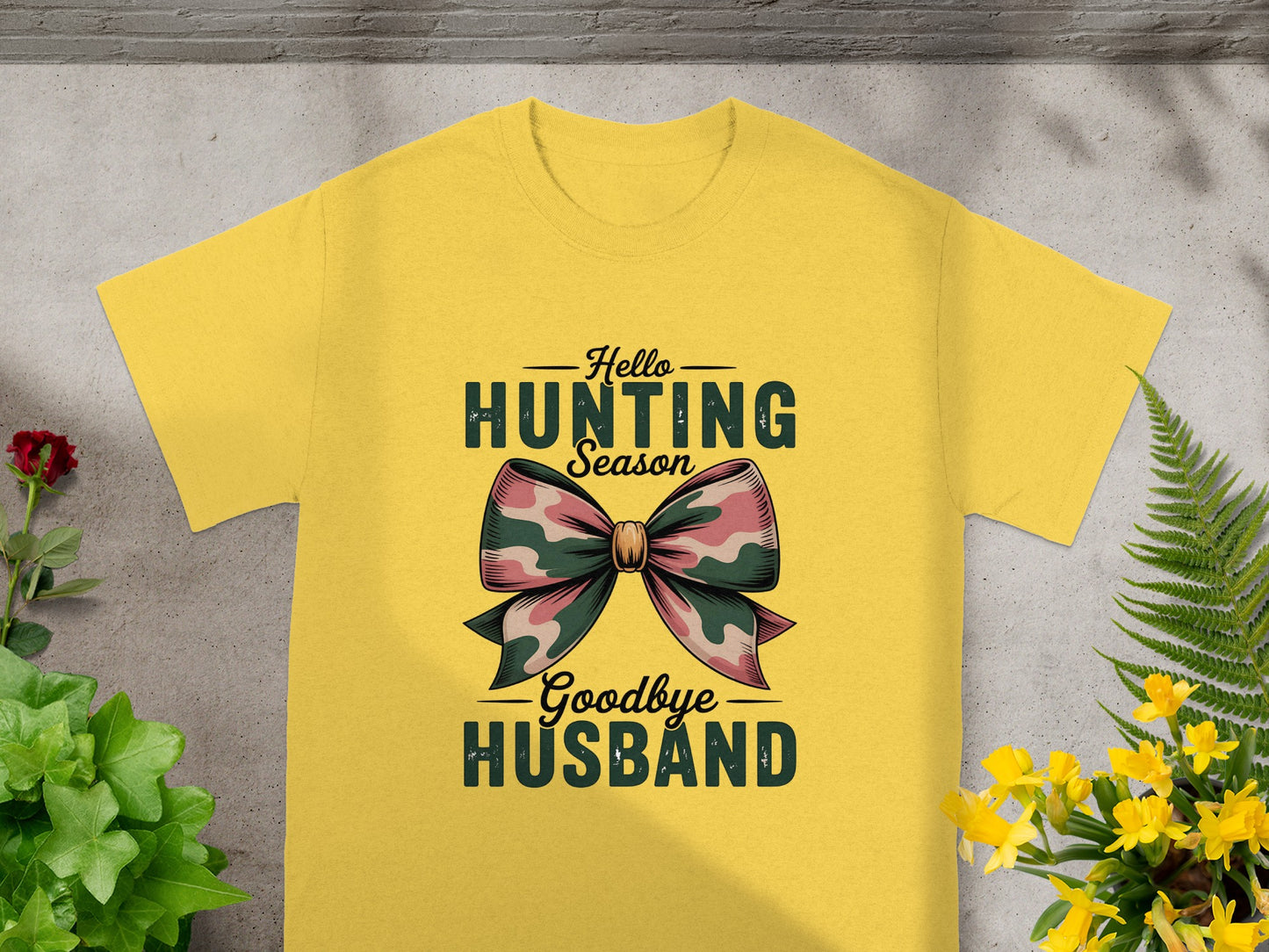 Yellow t-shirt with text "Hello Hunting Season Goodbye Husband" and a camouflage bow.