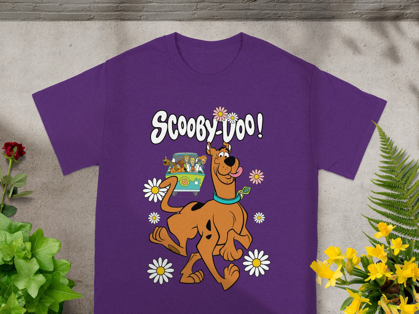 Scooby-Doo graphic t-shirt with Scooby and the Mystery Machine, surrounded by daisies.