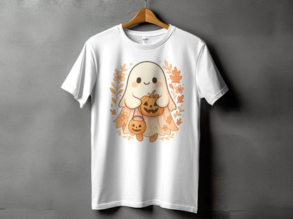 White t-shirt with a cute ghost holding pumpkins and surrounded by autumn leaves.