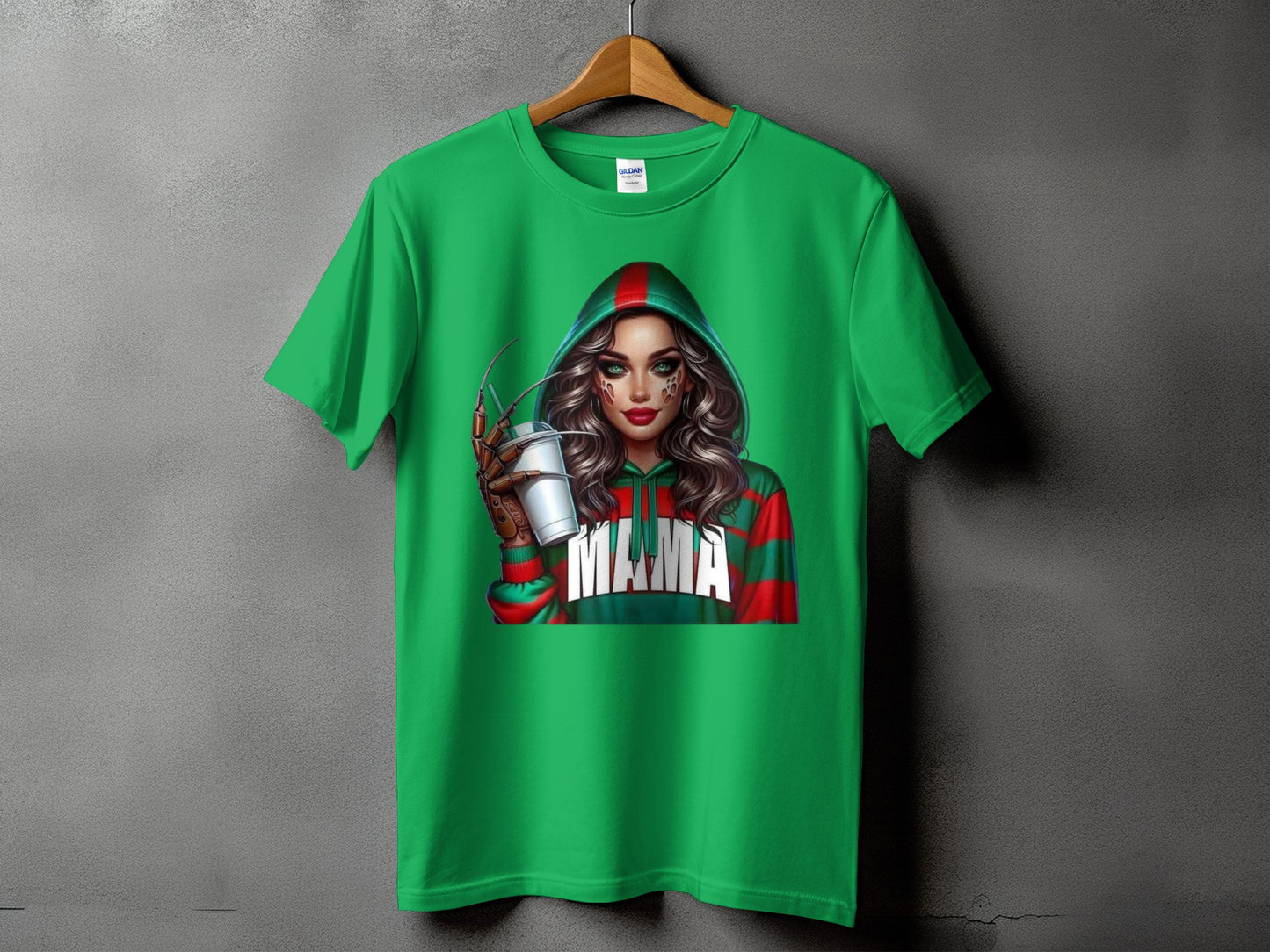 Green t-shirt with a graphic of a woman holding a cup, wearing a hooded jacket with "MAMA" text.