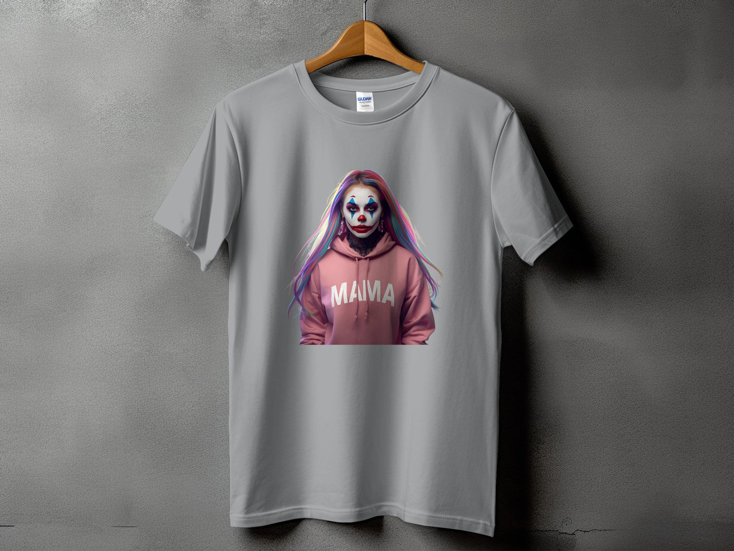 Grey t-shirt with a pink hoodie graphic featuring a clown with colorful hair and the word "MAMA".