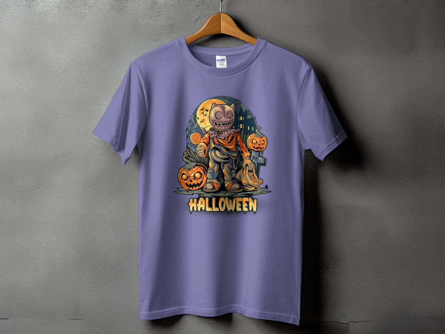 Purple t-shirt with a Halloween graphic of a scarecrow and pumpkins.