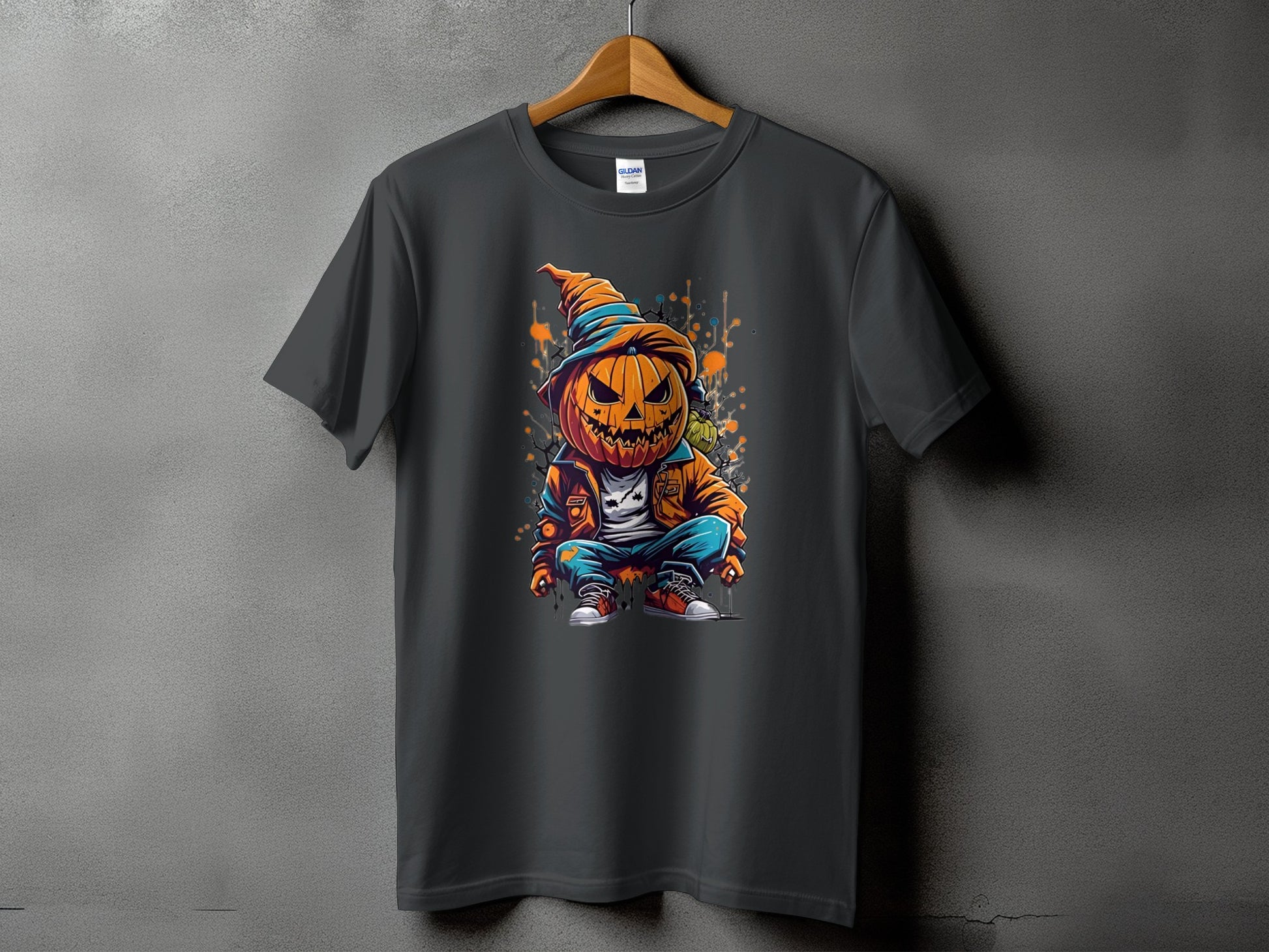 Dark t-shirt with graphic of a cartoon pumpkin man in hat and jacket.