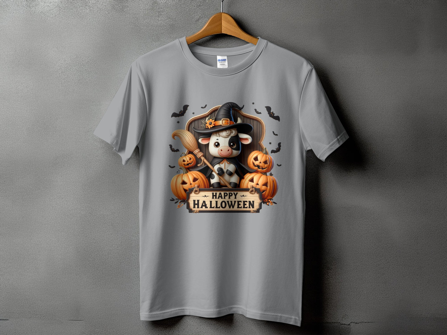 Cow wearing a witch hat with pumpkins and text "Happy Halloween."
