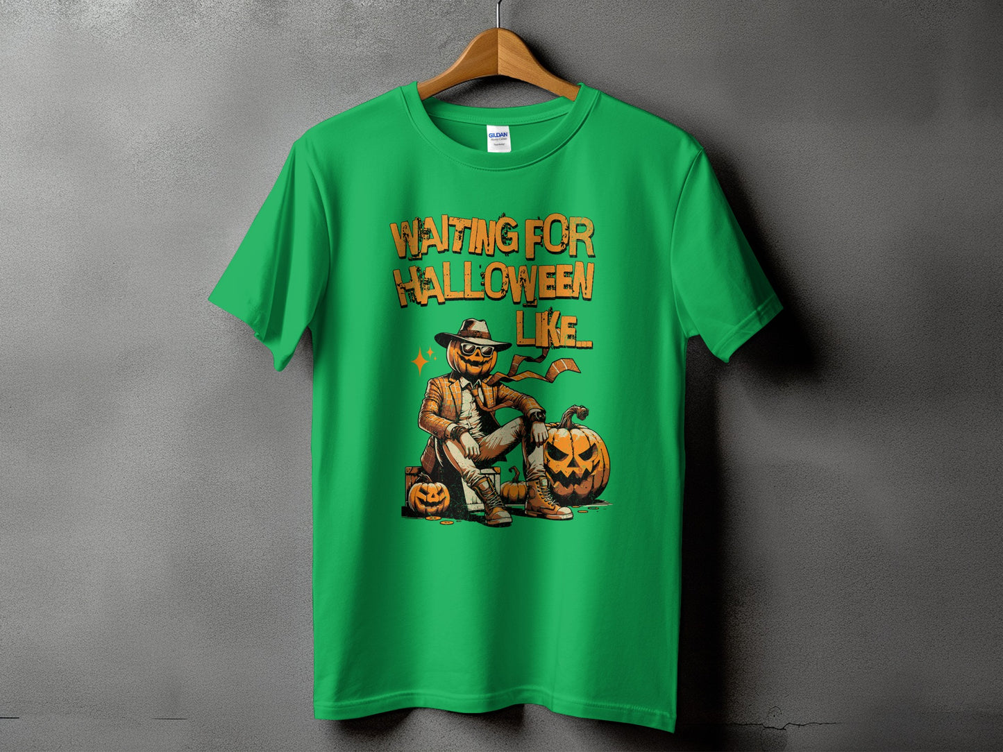 Green t-shirt with "Waiting For Halloween Like..." text and pumpkin character graphic.