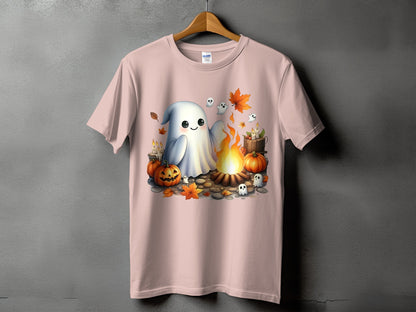 Pink t-shirt with a cute ghost, pumpkins, and campfire Halloween graphic.