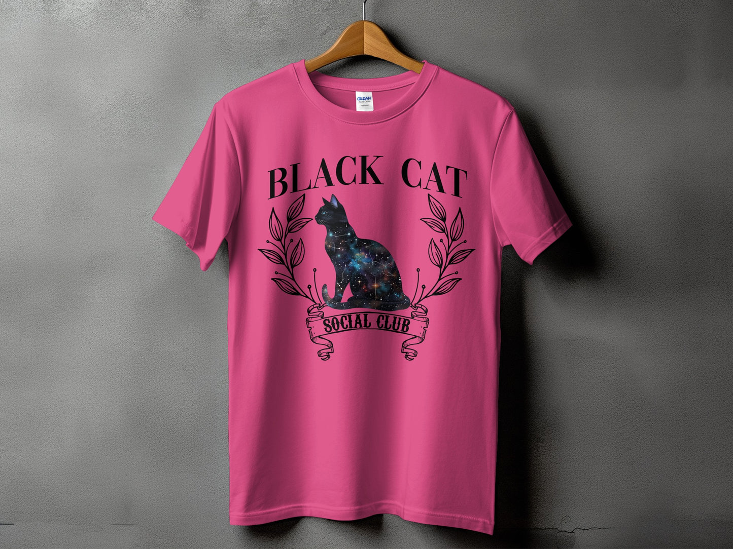 Pink t-shirt with black cat galaxy graphic and "BLACK CAT SOCIAL CLUB" text.