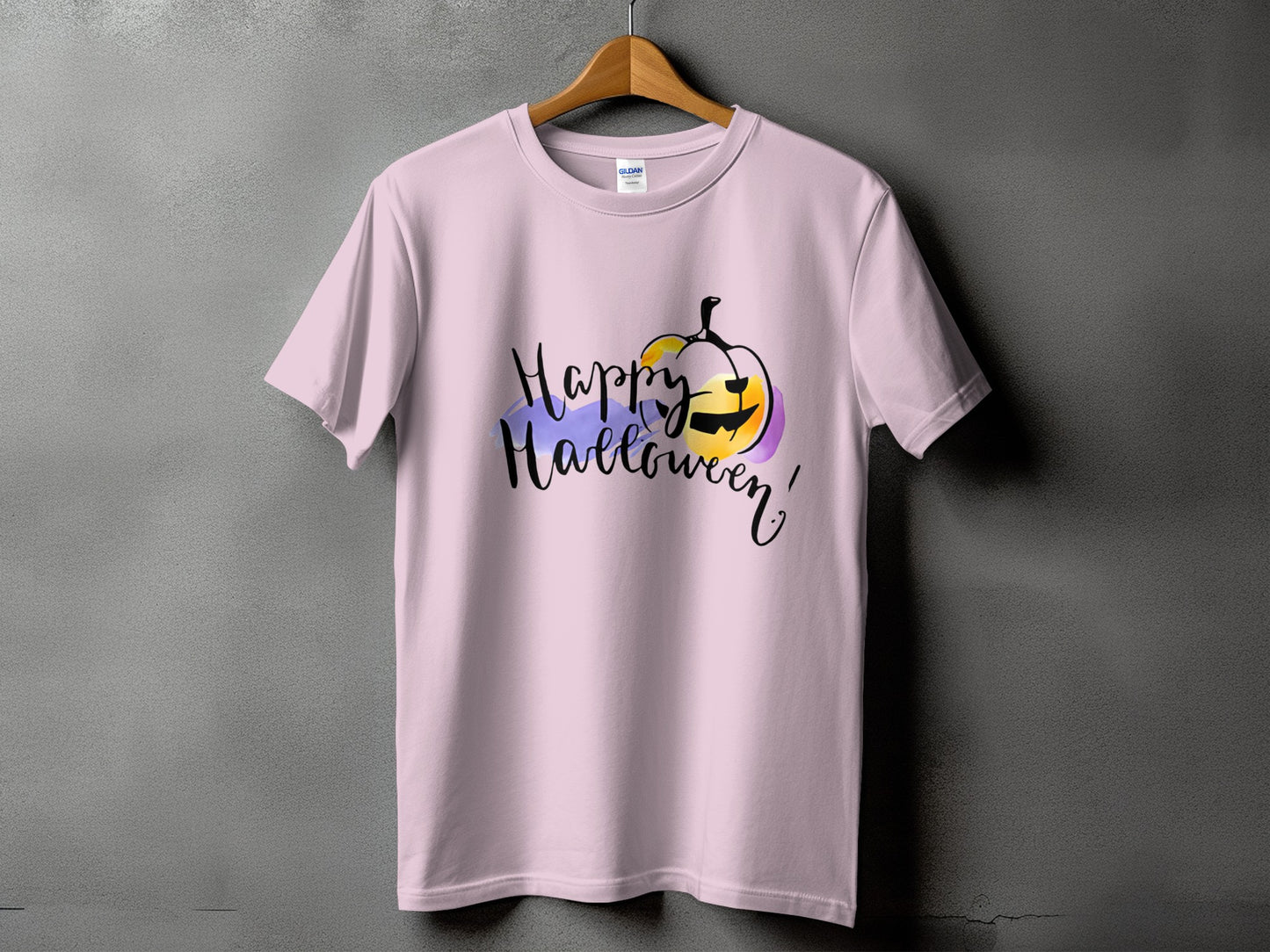 Pink t-shirt with "Happy Halloween" text and a jack-o-lantern graphic.