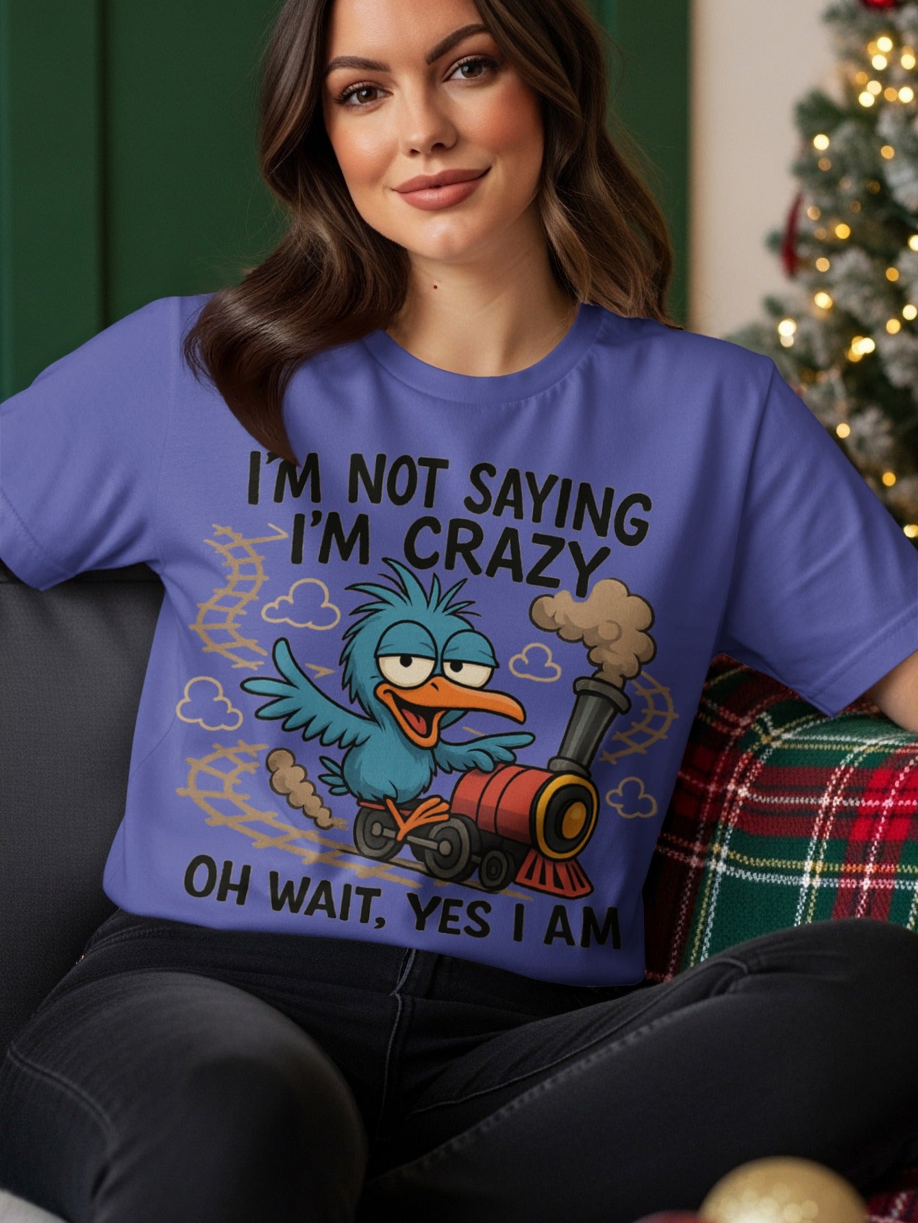 Blue cartoon bird on a train with text "I'm not saying I'm crazy. Oh wait, yes I am."