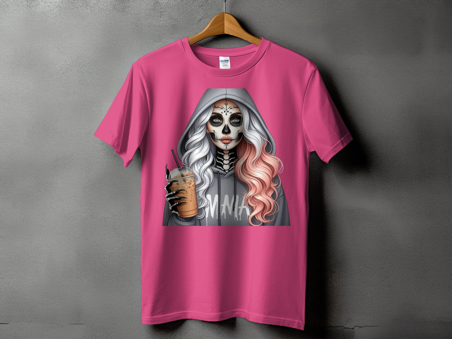 Pink t-shirt with a graphic of a skull-faced person holding a drink.