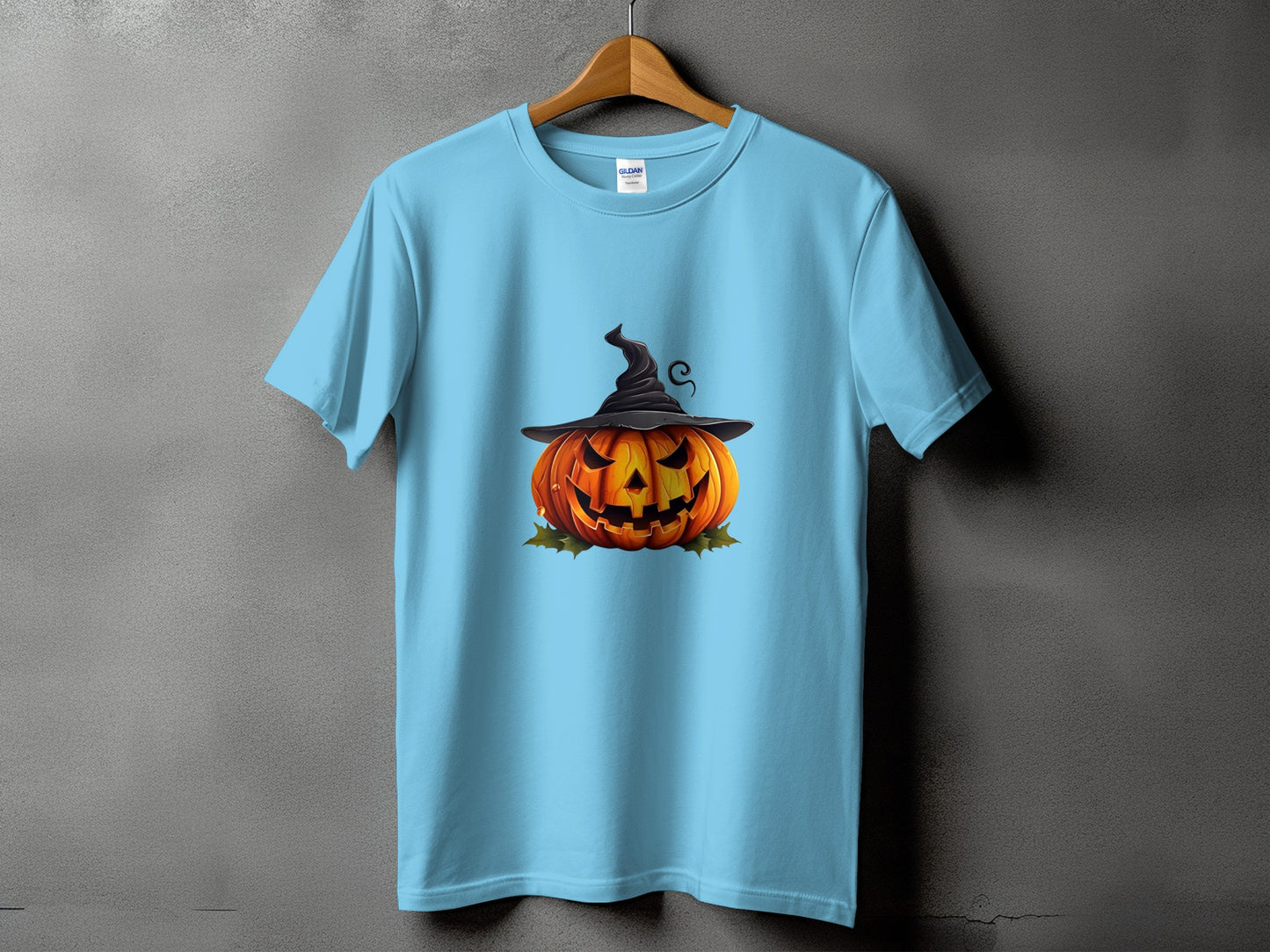 Light blue t-shirt with a Halloween pumpkin wearing a witch hat graphic.