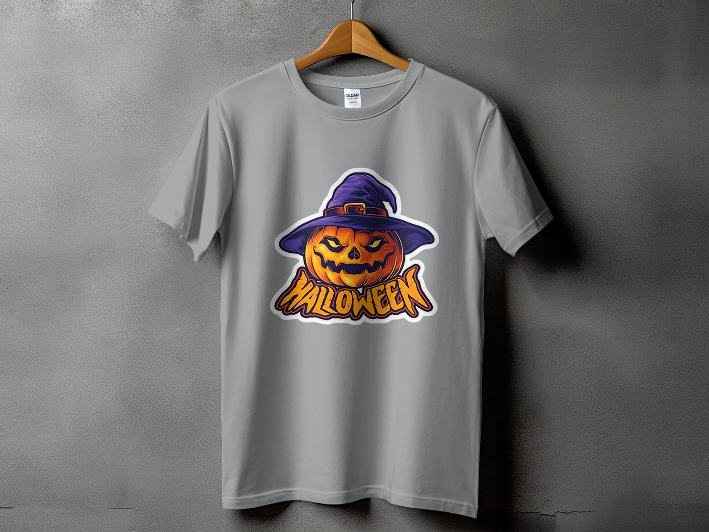 Grey t-shirt with a Halloween pumpkin wearing a purple hat graphic.