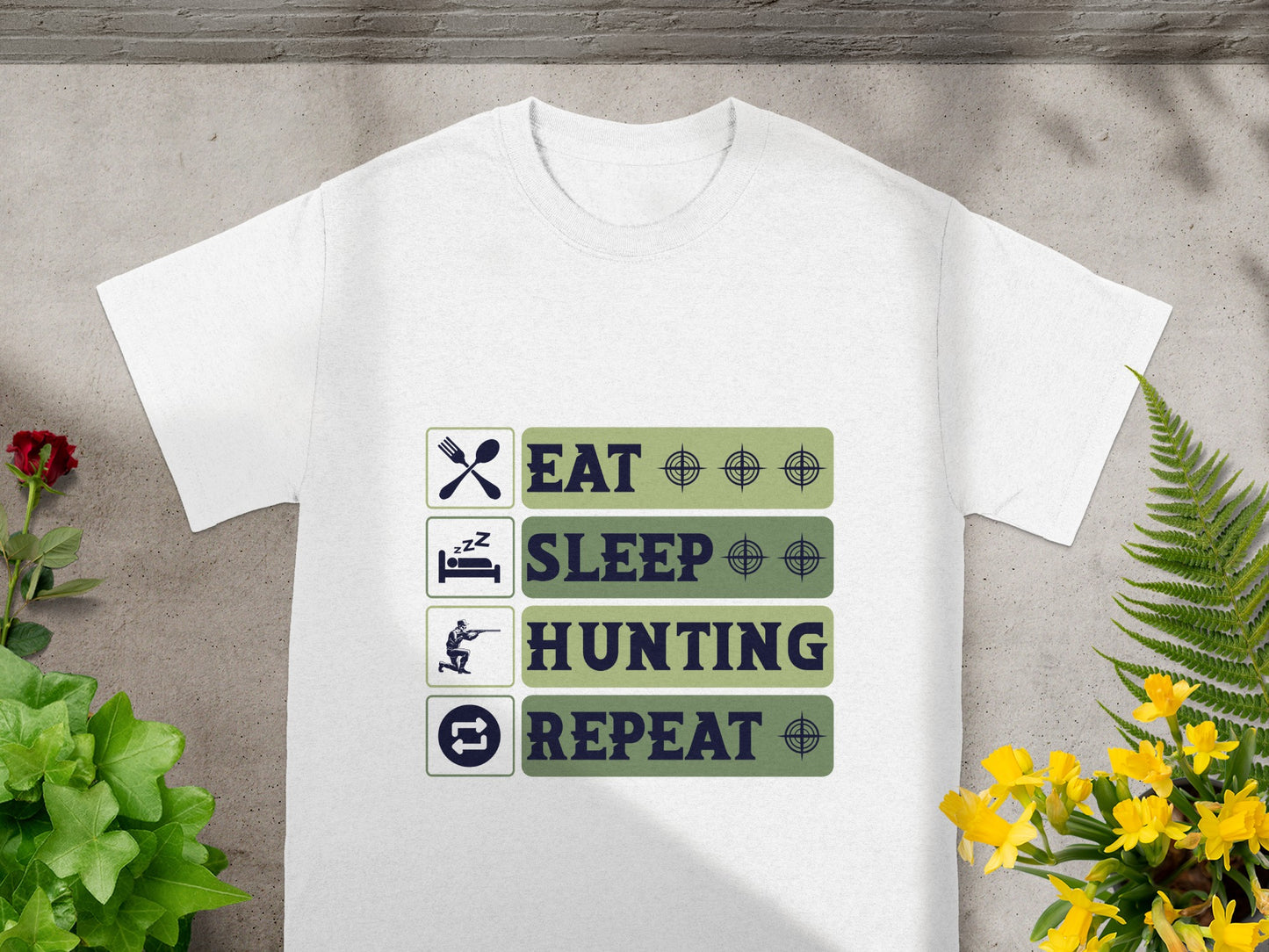 White t-shirt with "Eat, Sleep, Hunting, Repeat" graphic and icons.