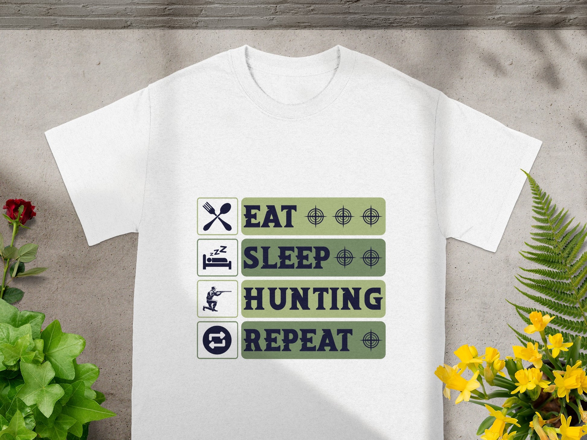 White t-shirt with "Eat, Sleep, Hunting, Repeat" graphic and icons.