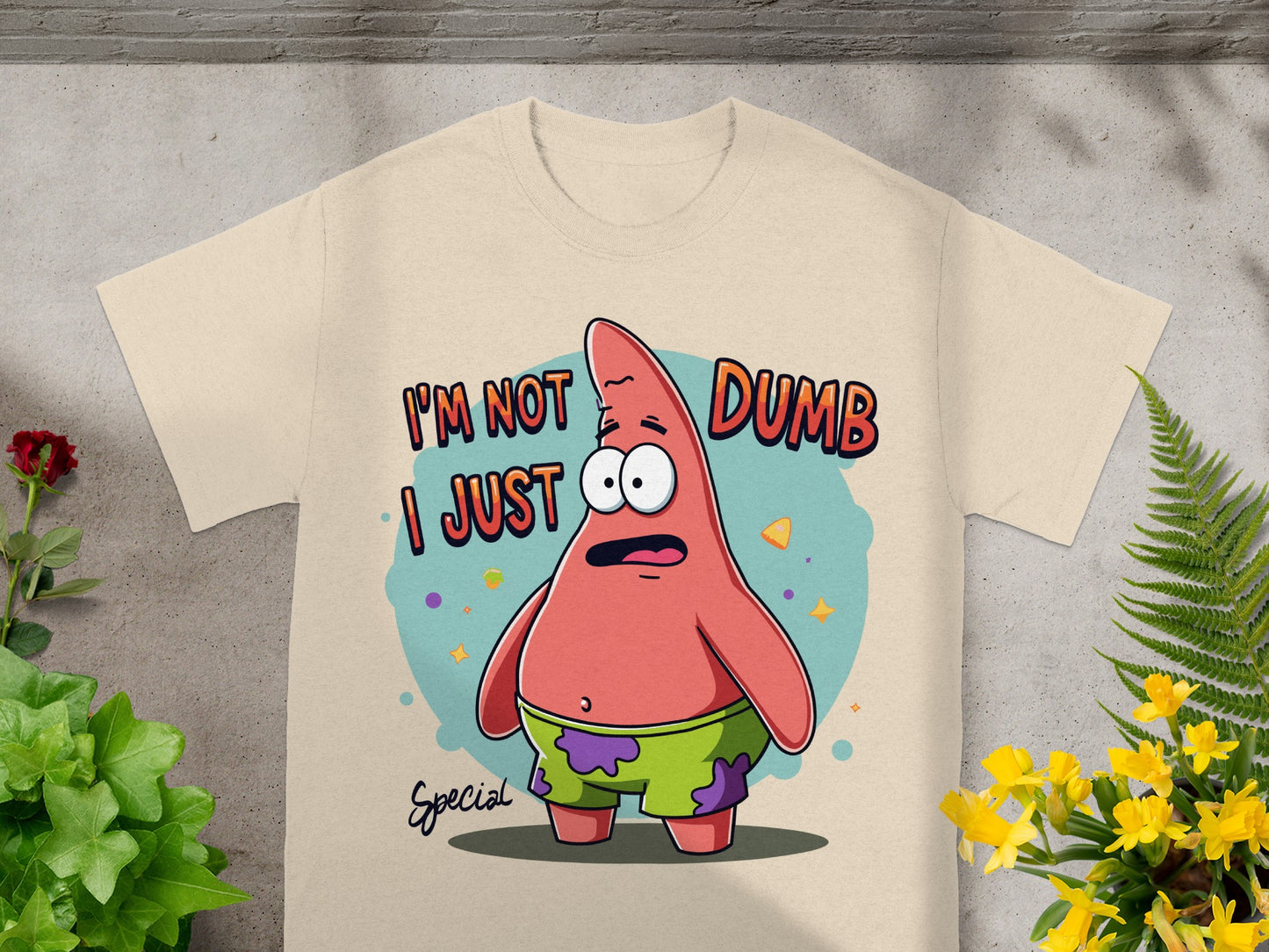 Patrick Star from SpongeBob SquarePants on a beige t-shirt with text.