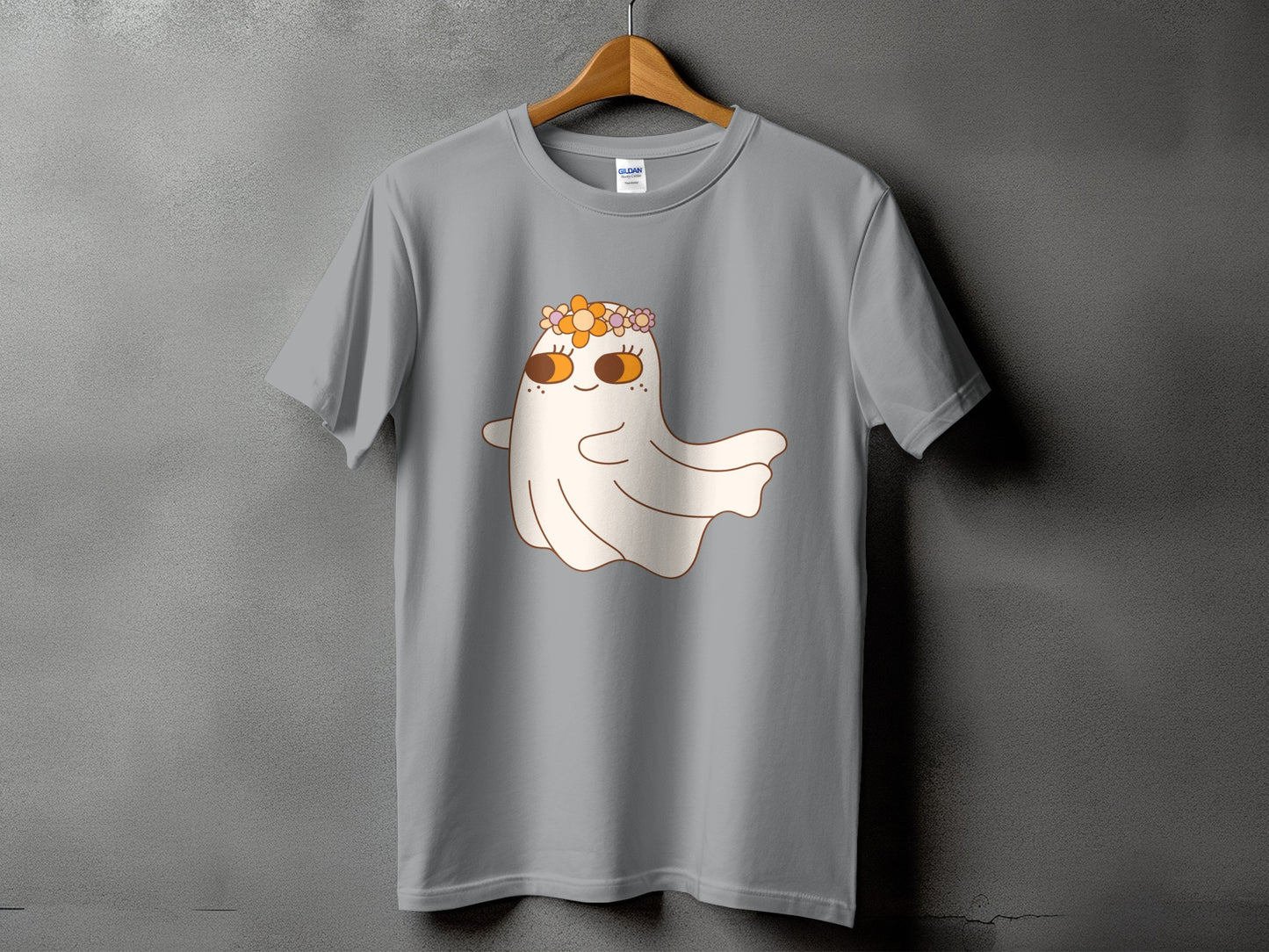 Gray t-shirt with a cartoon ghost wearing a flower crown and smiling.