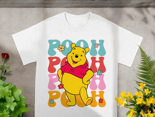 Winnie the Pooh graphic on white t-shirt with "POOH" text.