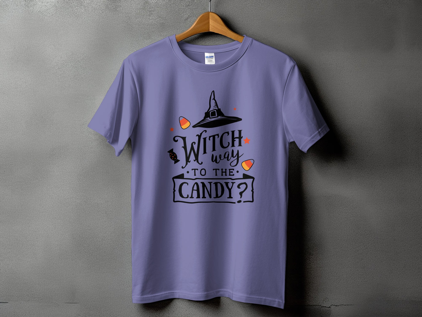 Purple t-shirt with black Halloween graphic and text: Witch way to the candy?